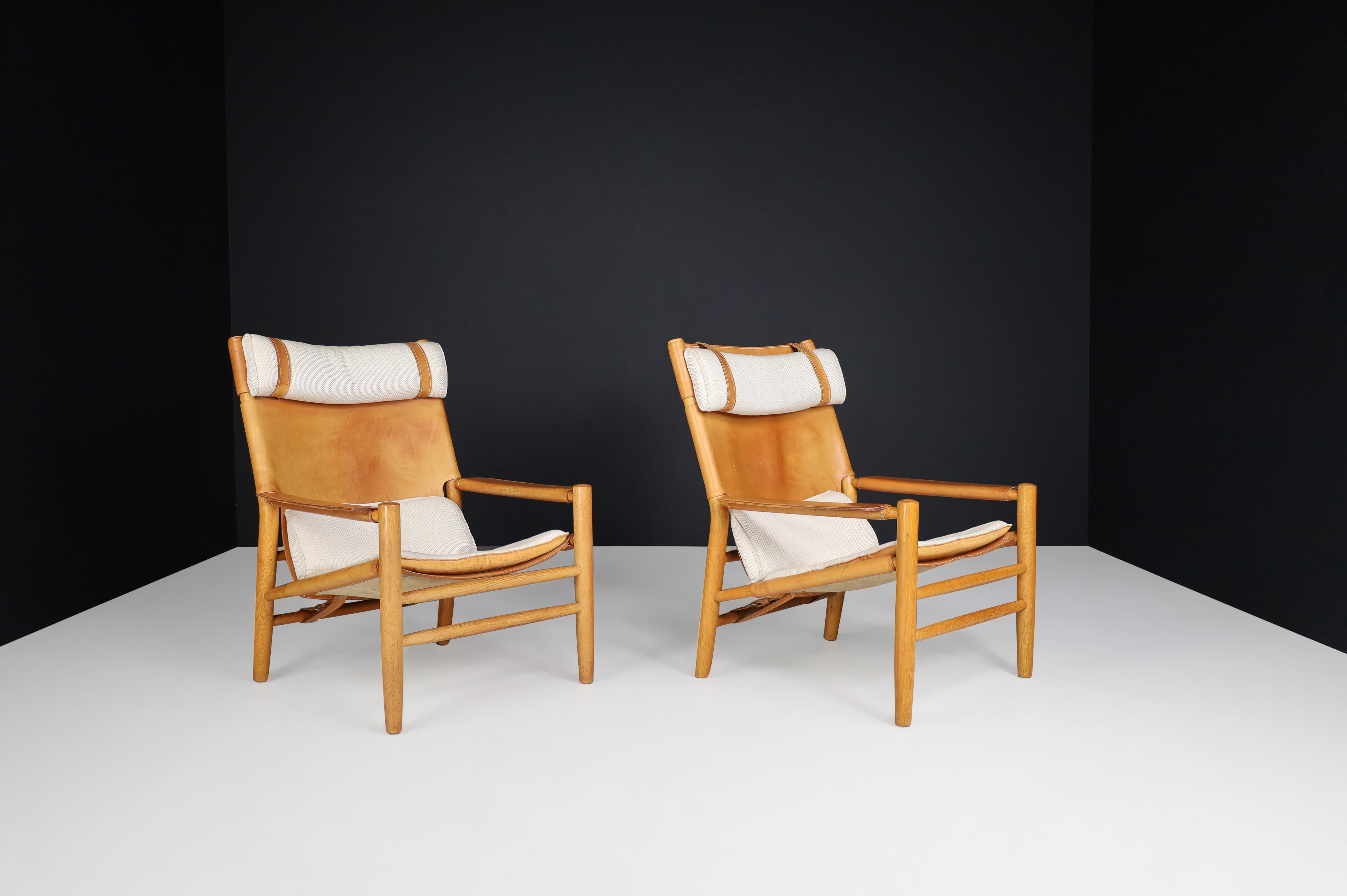 Scandinavian Modern Kenneth Bergenblad for DUX 'Dormi' Leather and Oak Lounge Chairs, Sweden 1970s  