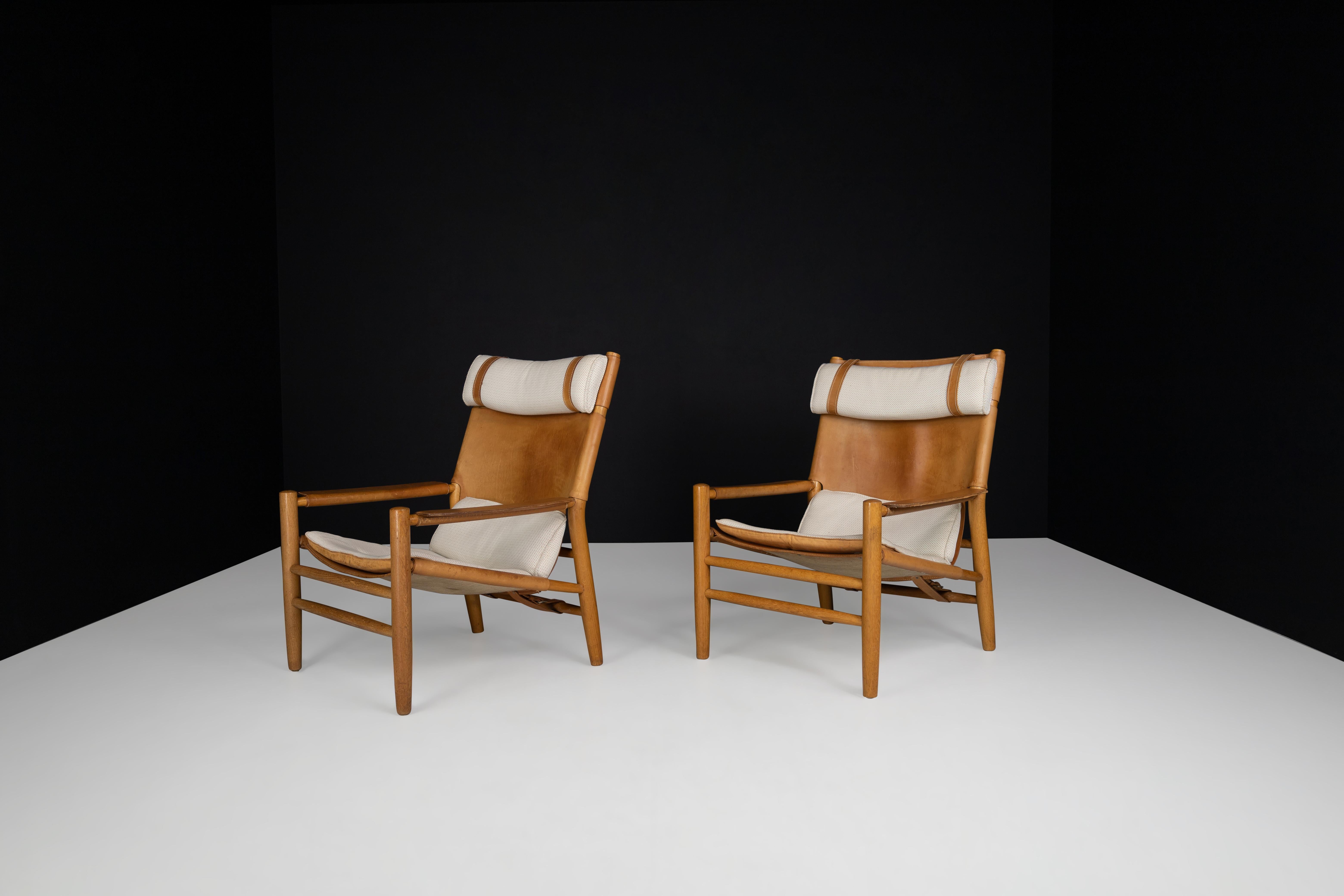 Swedish Kenneth Bergenblad for DUX 'Dormi' Leather and Oak Lounge Chairs, Sweden 1970s  