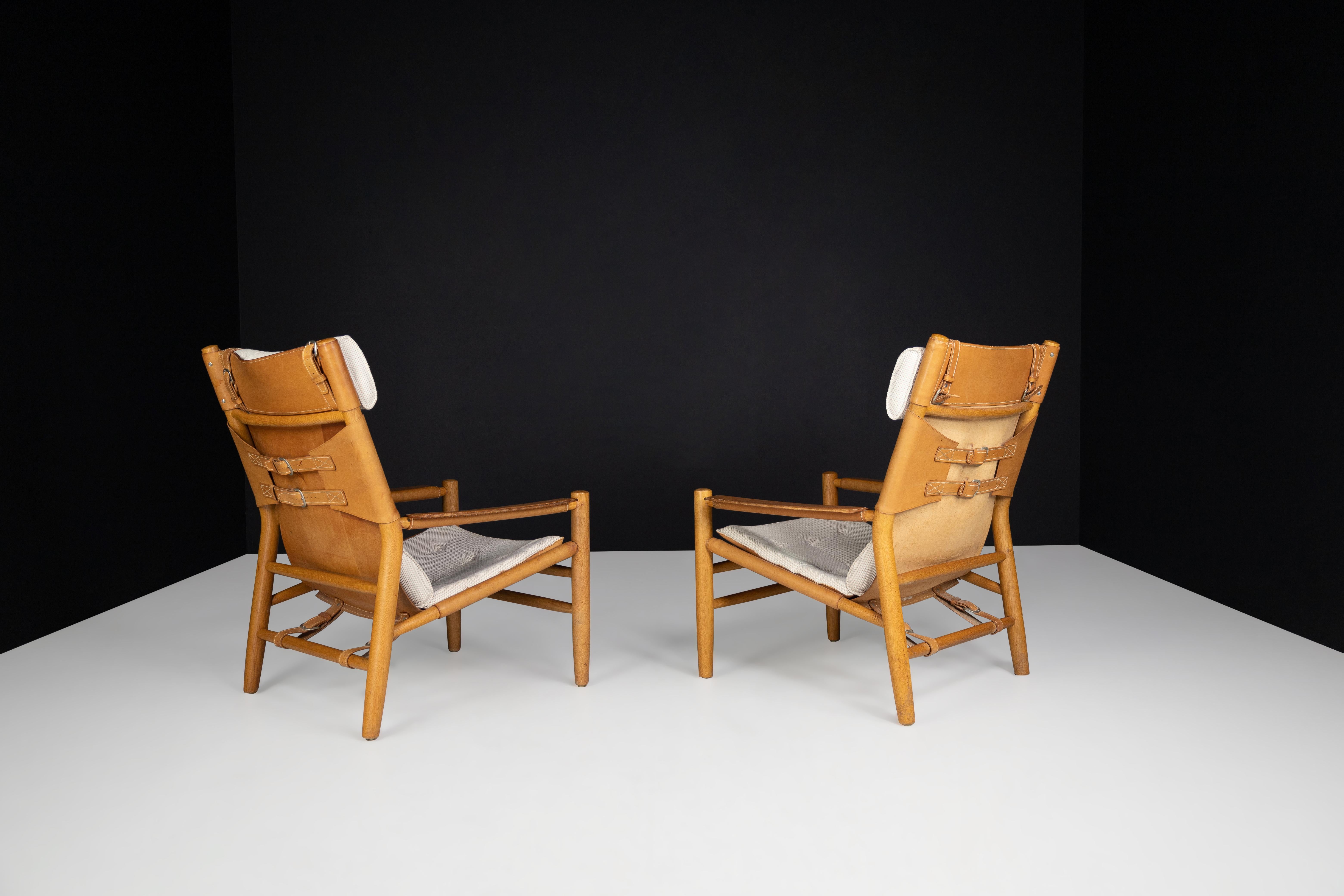 20th Century Kenneth Bergenblad for DUX 'Dormi' Leather and Oak Lounge Chairs, Sweden 1970s  