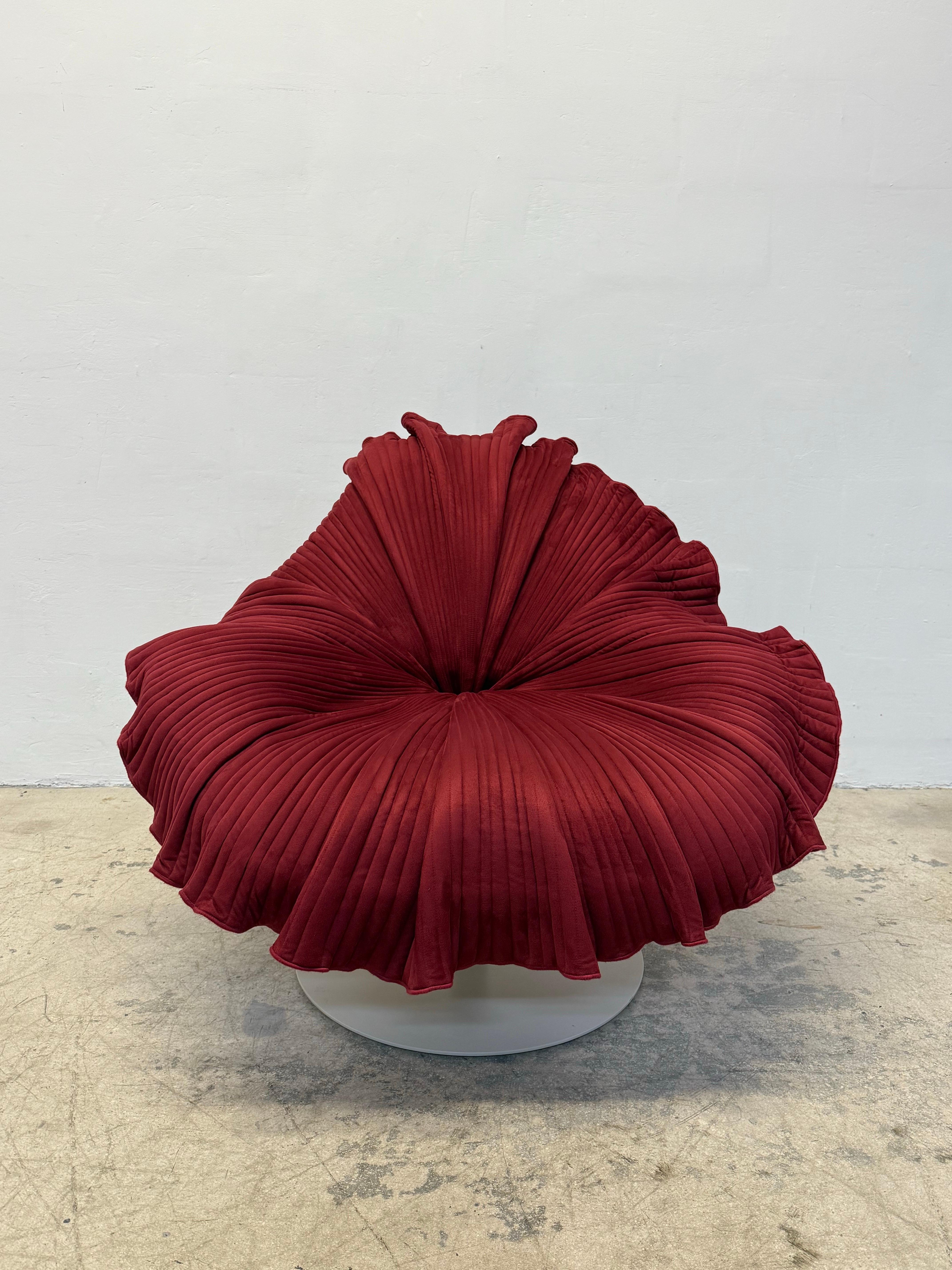 Organic modern Bloom lounge chair in muted red Italian microfiber hand-stitched fabric over a fiberglass reinforced top designed by Kenneth Cobonpue.  The stationary steel base is lacquered in original off-white.  Maintains signature plaque.