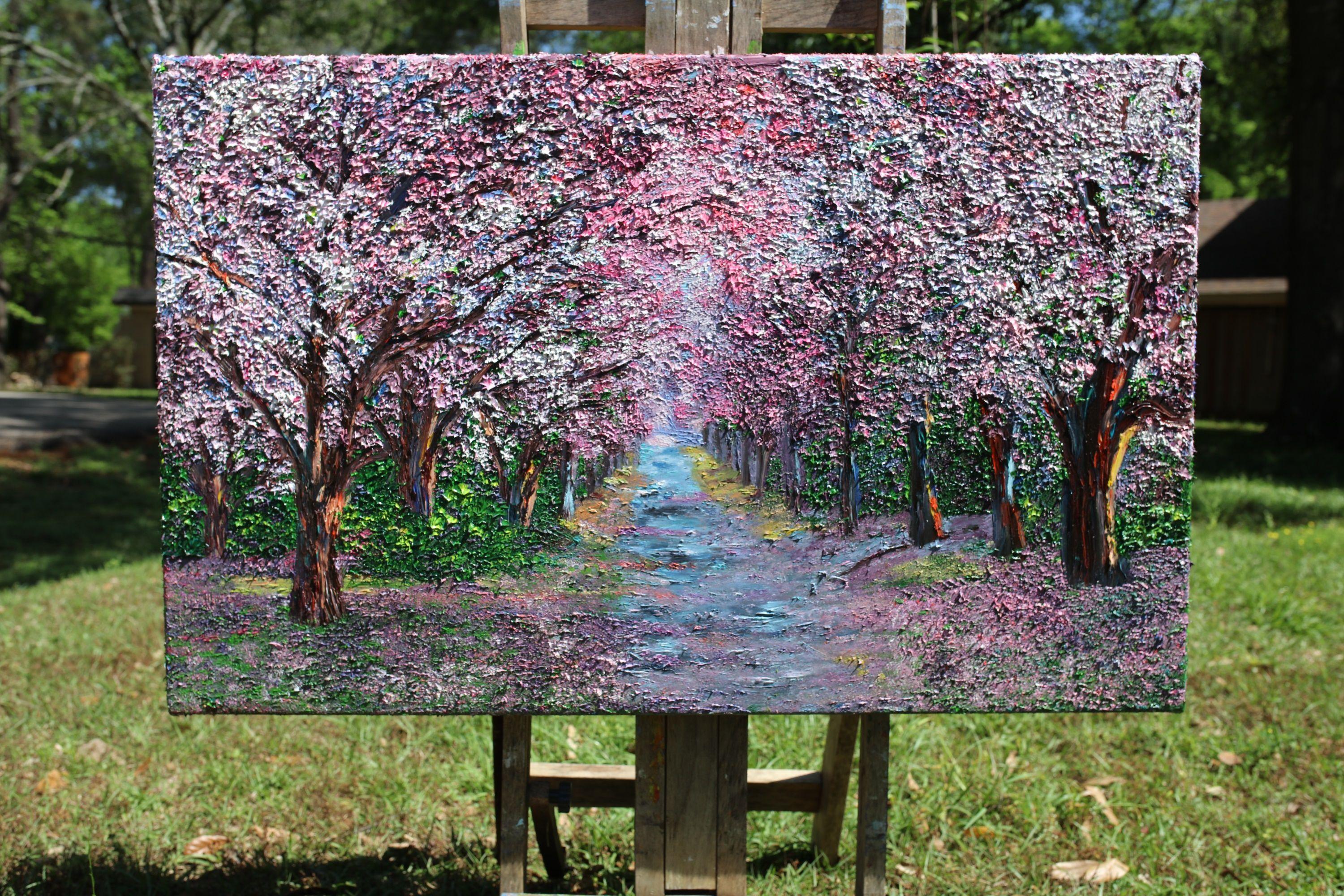 Imagine walking through this trail of beauty as the gentle motion of the blossoms whisper from the canopy above. The seasoned bark of the tree trunks provides a feeling of aged warmth as your eyes flicker at the roseate beauty above. The painting is