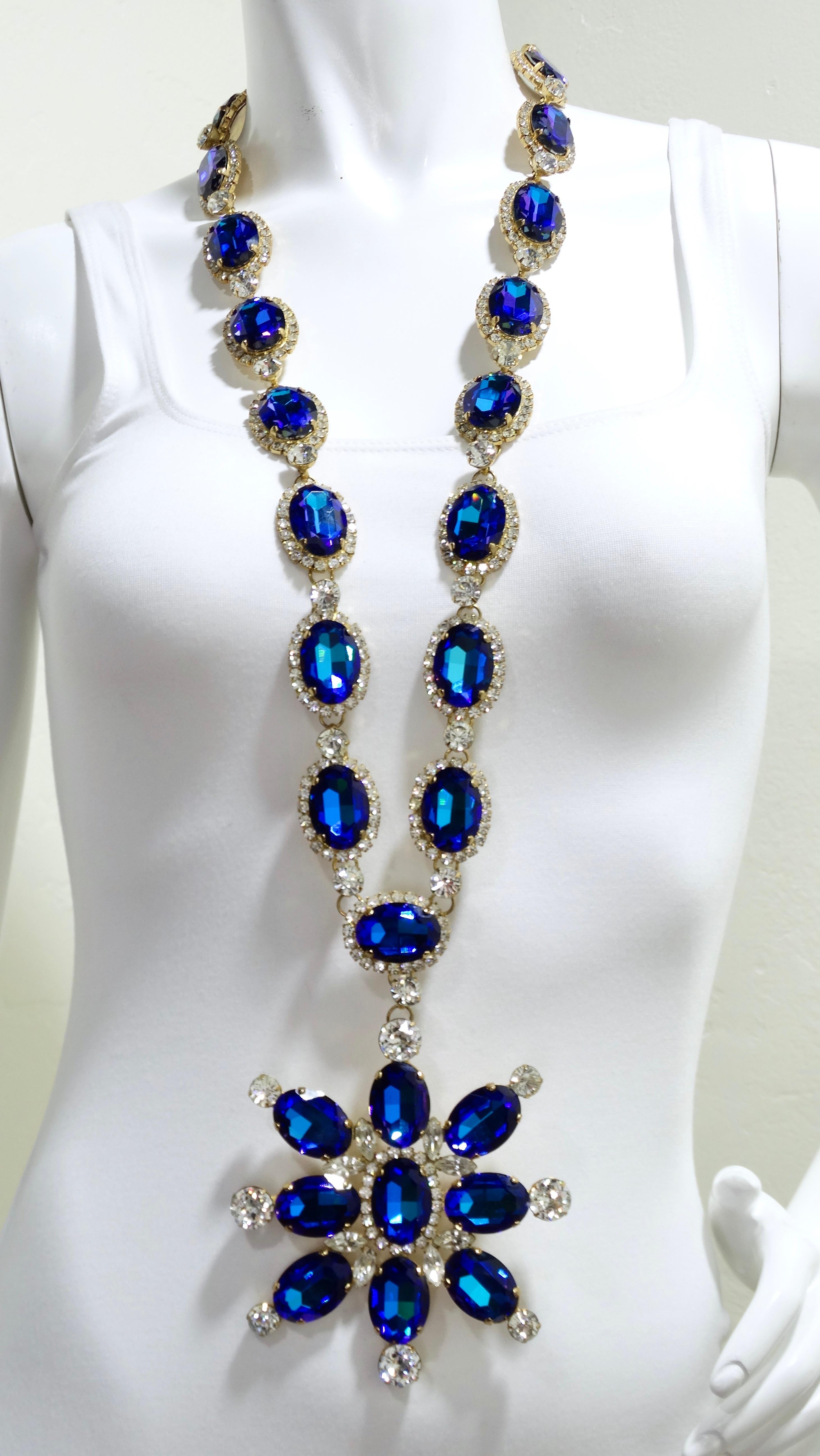 This statement necklace will put your statement necklace to shame. This beautiful and dramatic Kenneth (jay) Lane Necklace will elevate your jewelry collection and have everyone in awe. Details include a flower-shaped pendant made of giant blue