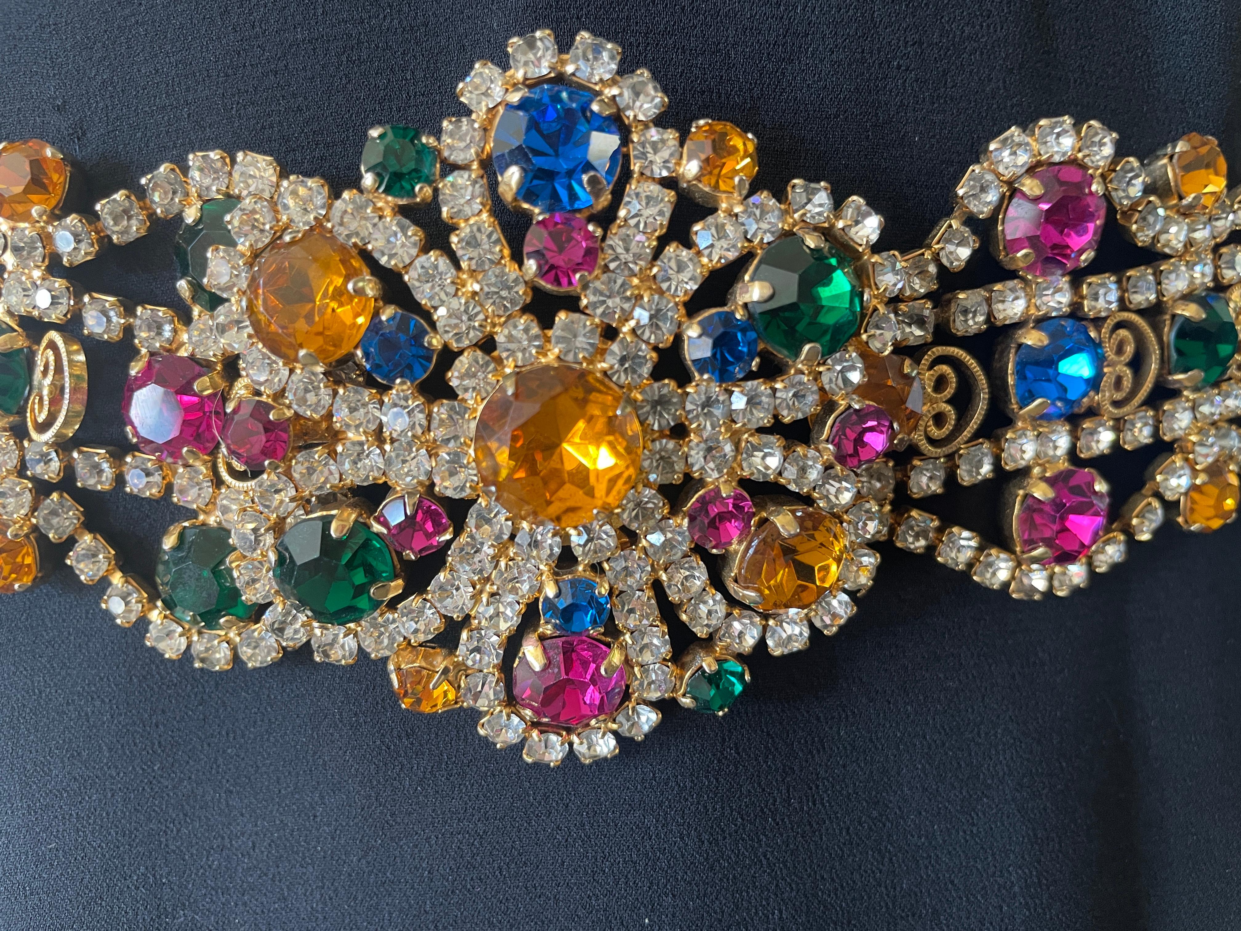Kenneth Jay Lane Gobsmacking Vintage Crystal and Gemstone Belt
This is a sensational piece. 
Crystal with topaz , saphire, emerald  and ruby crystals
Excellent condition
Will fit up to a 32