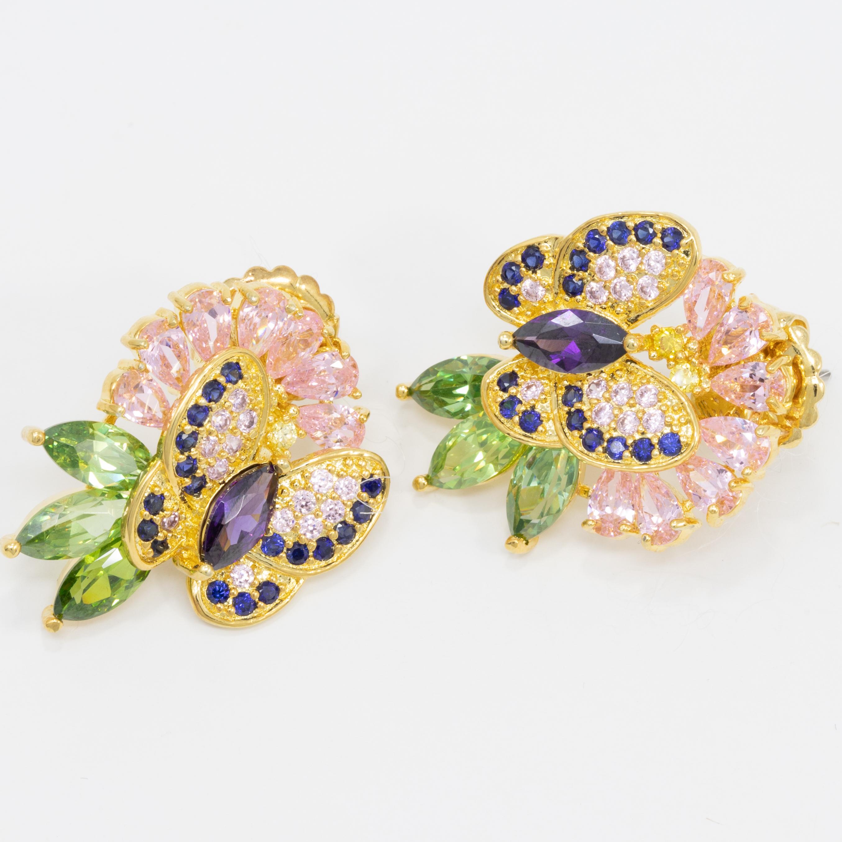 Add a little natural beauty to your outfit with these sparkling flower and butterfly earrings!

Gold plated button earrings by Kenneth Jay Lane. Light rose, amethyst, and peridot cubic zirconia crystals.

CZ by Kenneth Jay Lane