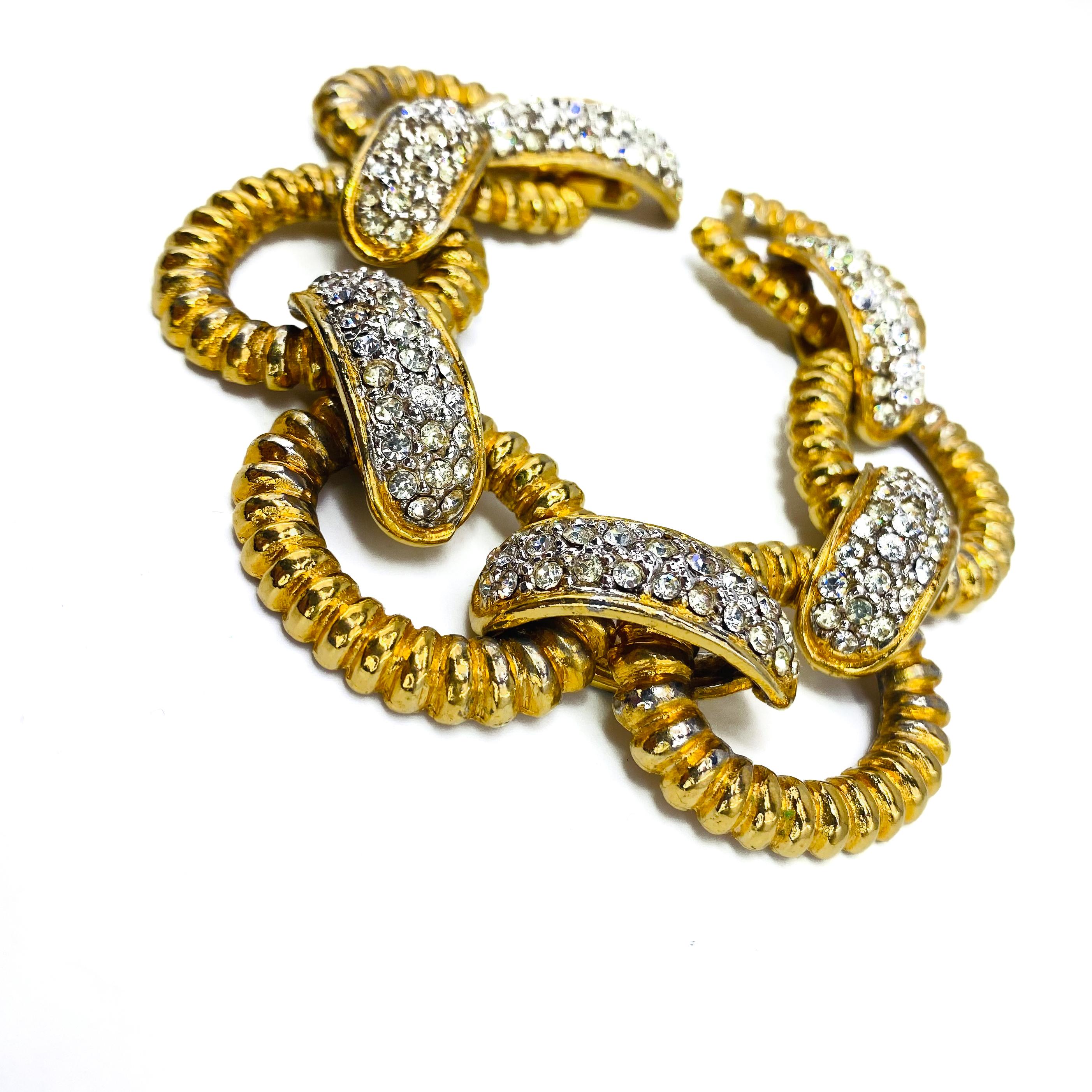 Kenneth Jay Lane Vintage 1980s Bracelet
Timelessly classic 80s piece from the world's most famous costume jeweller

Detail
-Crafted from gold plated metal and set with tiny crystals
-Made in the United States in the 1980s
-Chunky textured