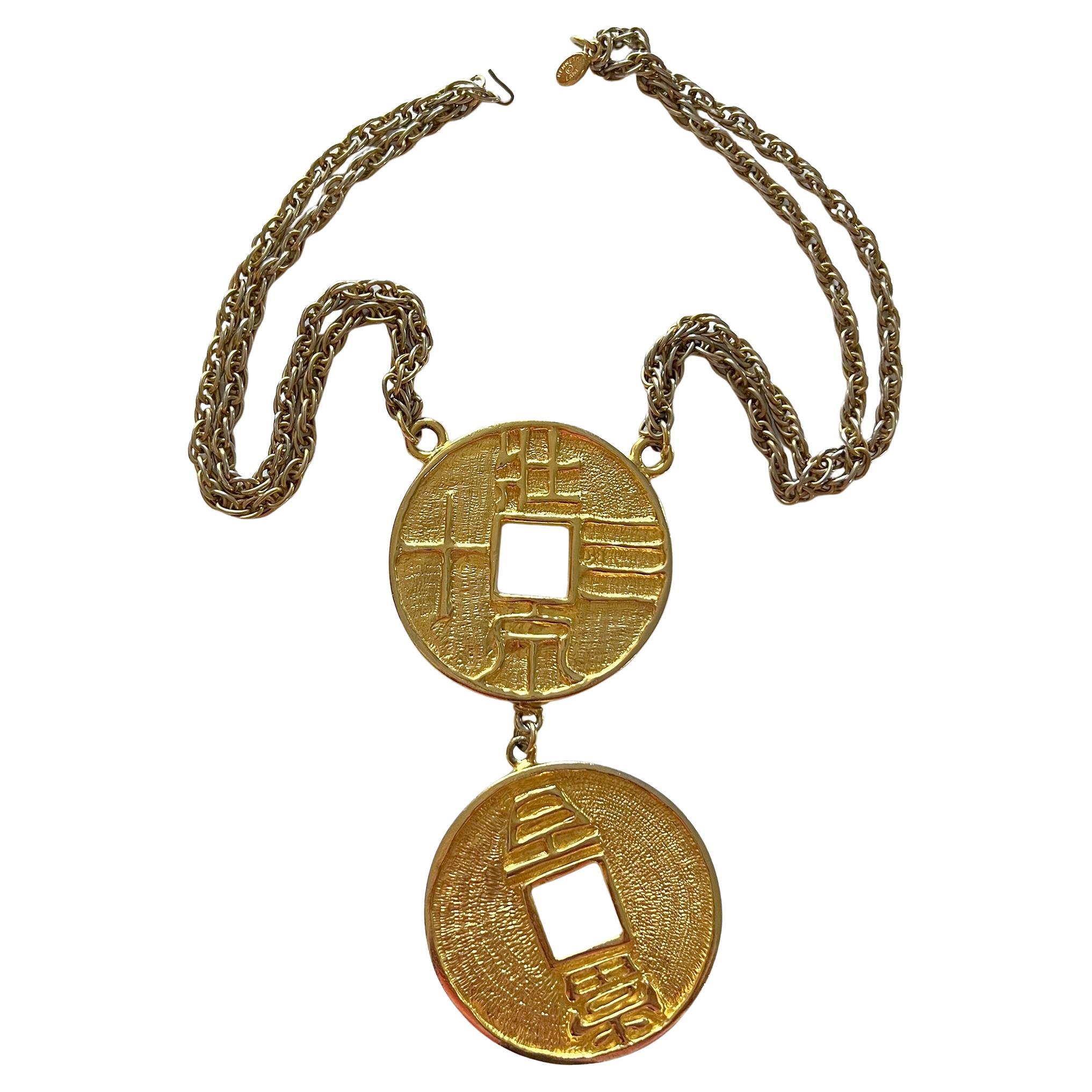 Double Chinese faux coin necklace designed by Kenneth Lane, circa 1960s / 1970s.  A 6