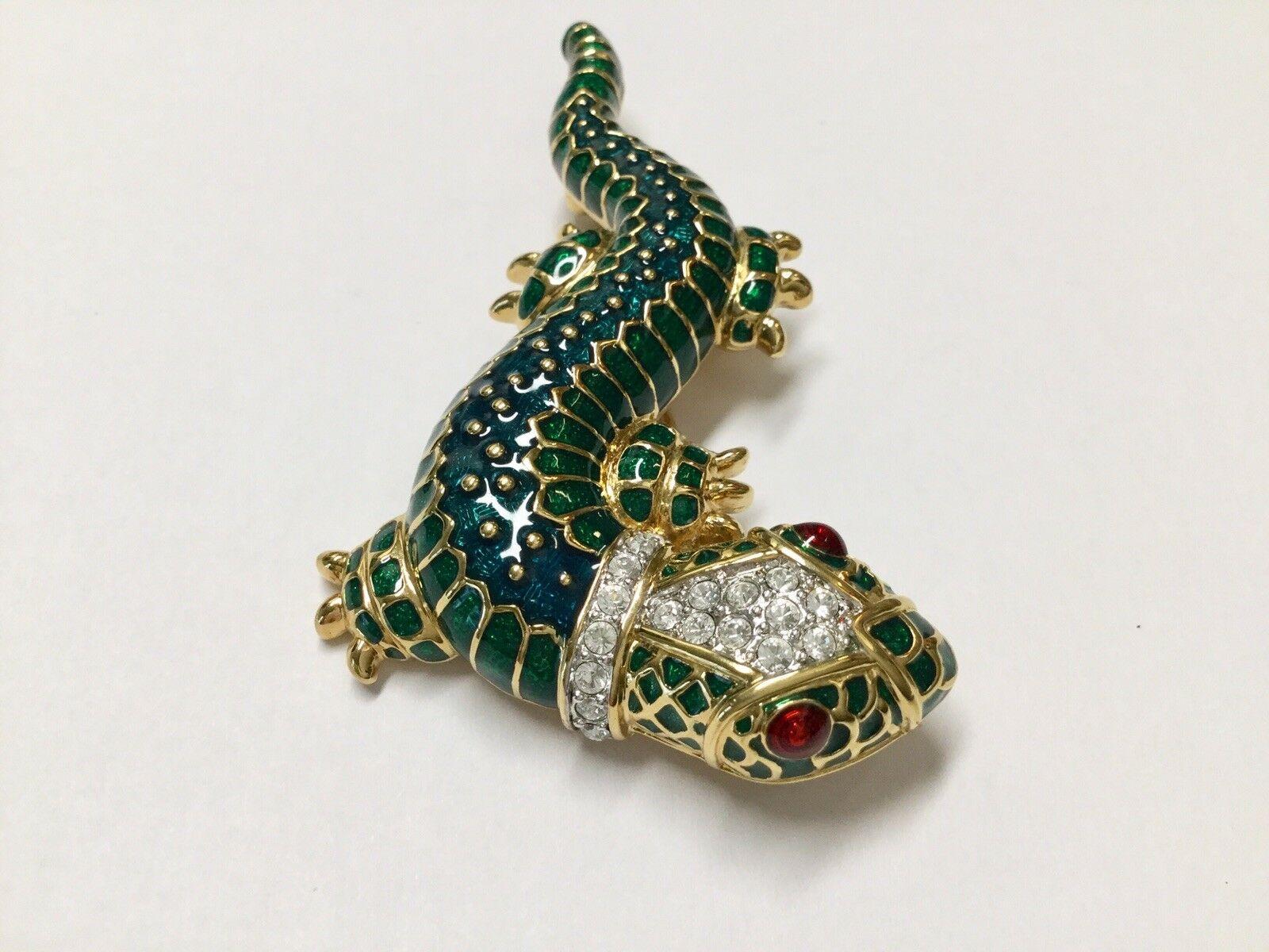 Vintage KENNETH JAY LANE Dark Green Enamel Lizard/Salamander Brooch pave set with Faux Diamonds and Red Enamel Eyes; Gold Tone mounting; signed: Signed KJL; Measures approx. 3 inches x 1.5 inches. To have, to hold, to keep Forever… An Heirloom to