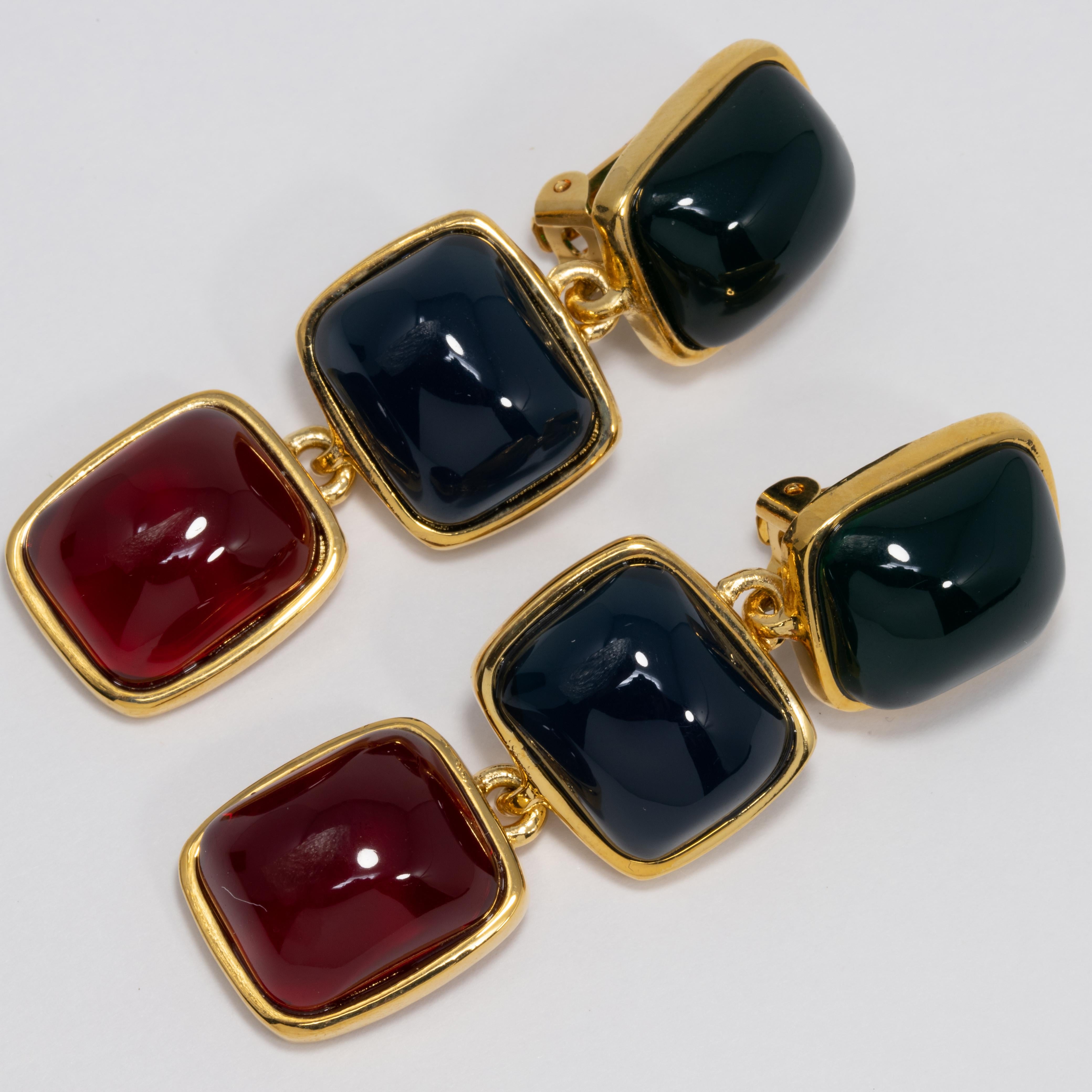 Stylish Kenneth Jay Lane earrings, featuring opaque green, red, and blue cabochons set in open-back gold-plated bezels. 


Hallmarks: KJL, China