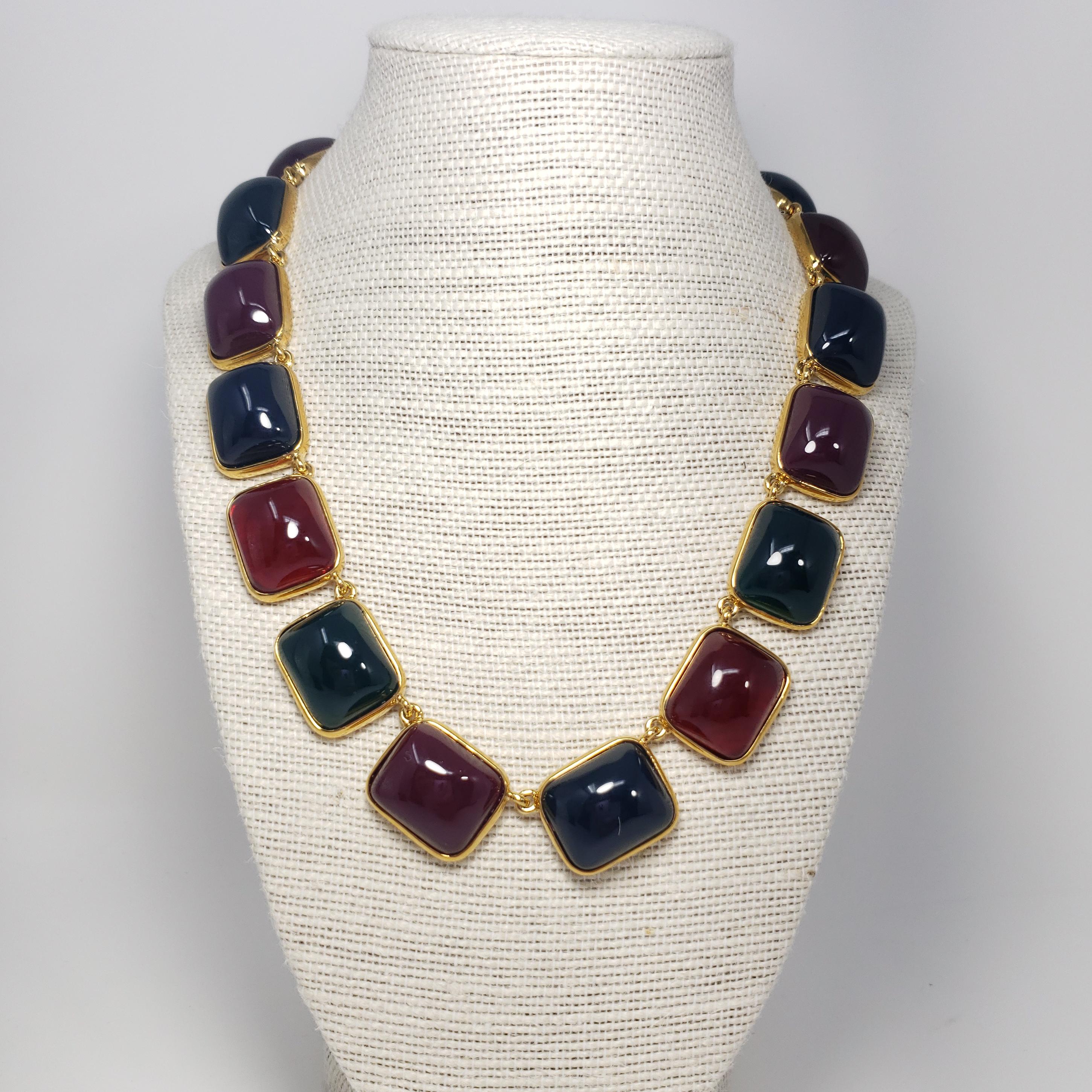  A stylish Kenneth Jay Lane necklace, featuring opaque green, red, and blue cabochons set in open-back gold-plated bezels. 

43.5 cm Length + 7 cm extension chain

Hallmarks: KJL, China