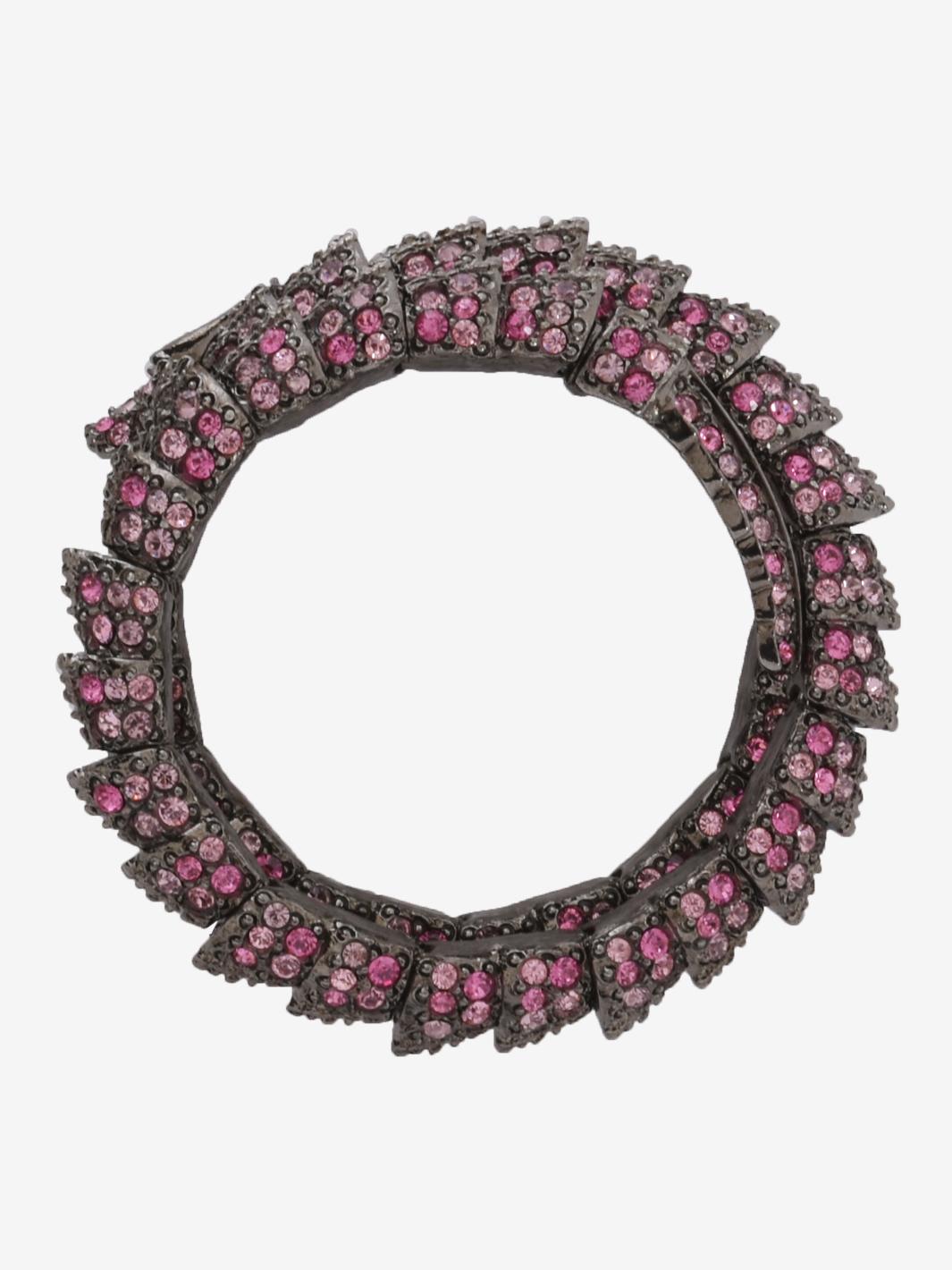 Kenneth Jay Lane Snake Bracelet with pink rhinestones. Bracelet with pink stones; clasp depicting the head of a snake. Bracelet with pink stones; spiral shape; depicting the head of a snake and with a scale-like body. 

STATE OF PRESERVATION
Optimal