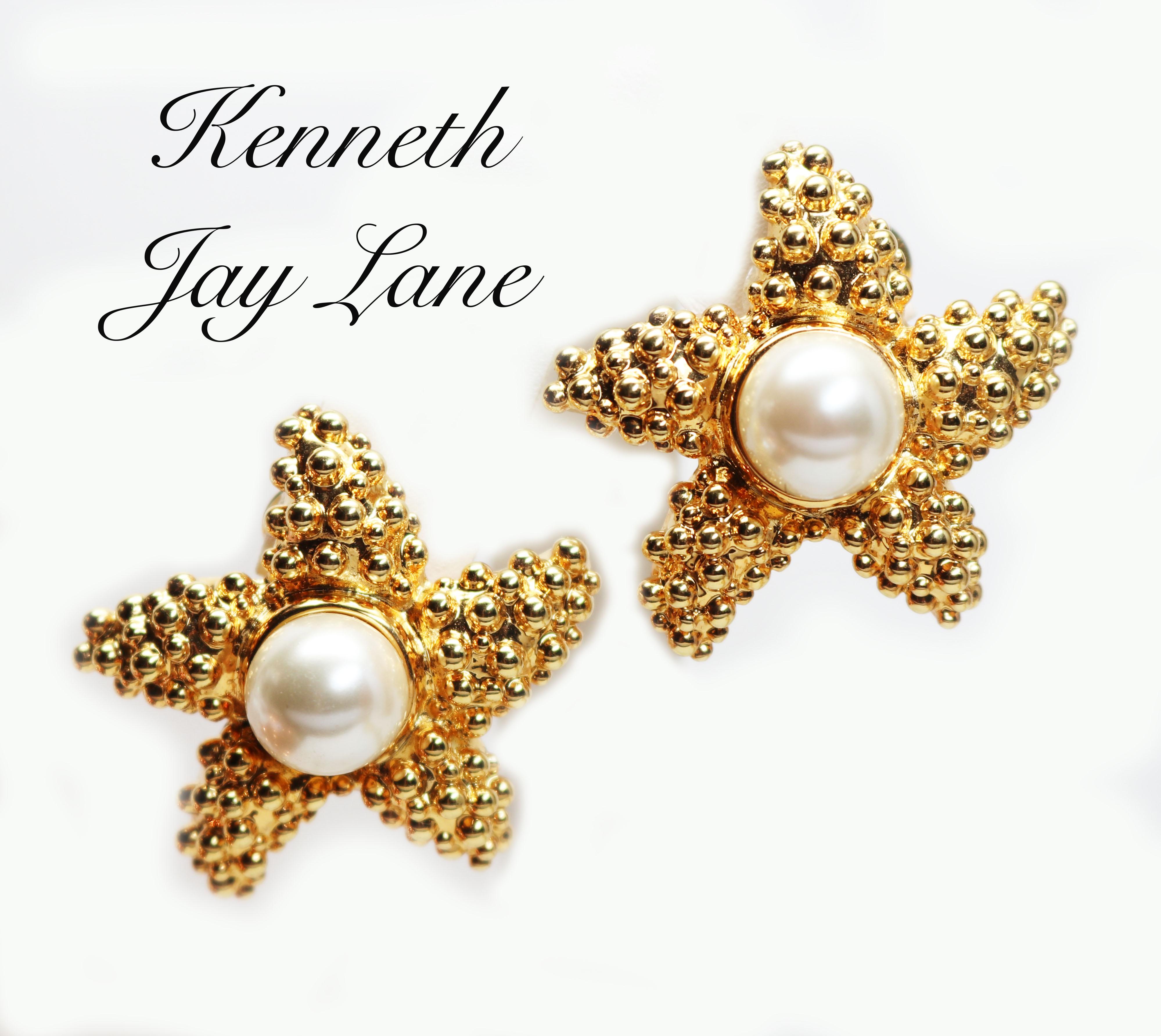 These vintage 1980s simulated pearl gold starfish clip-on earrings are signed KJL, measure approx. 1.25