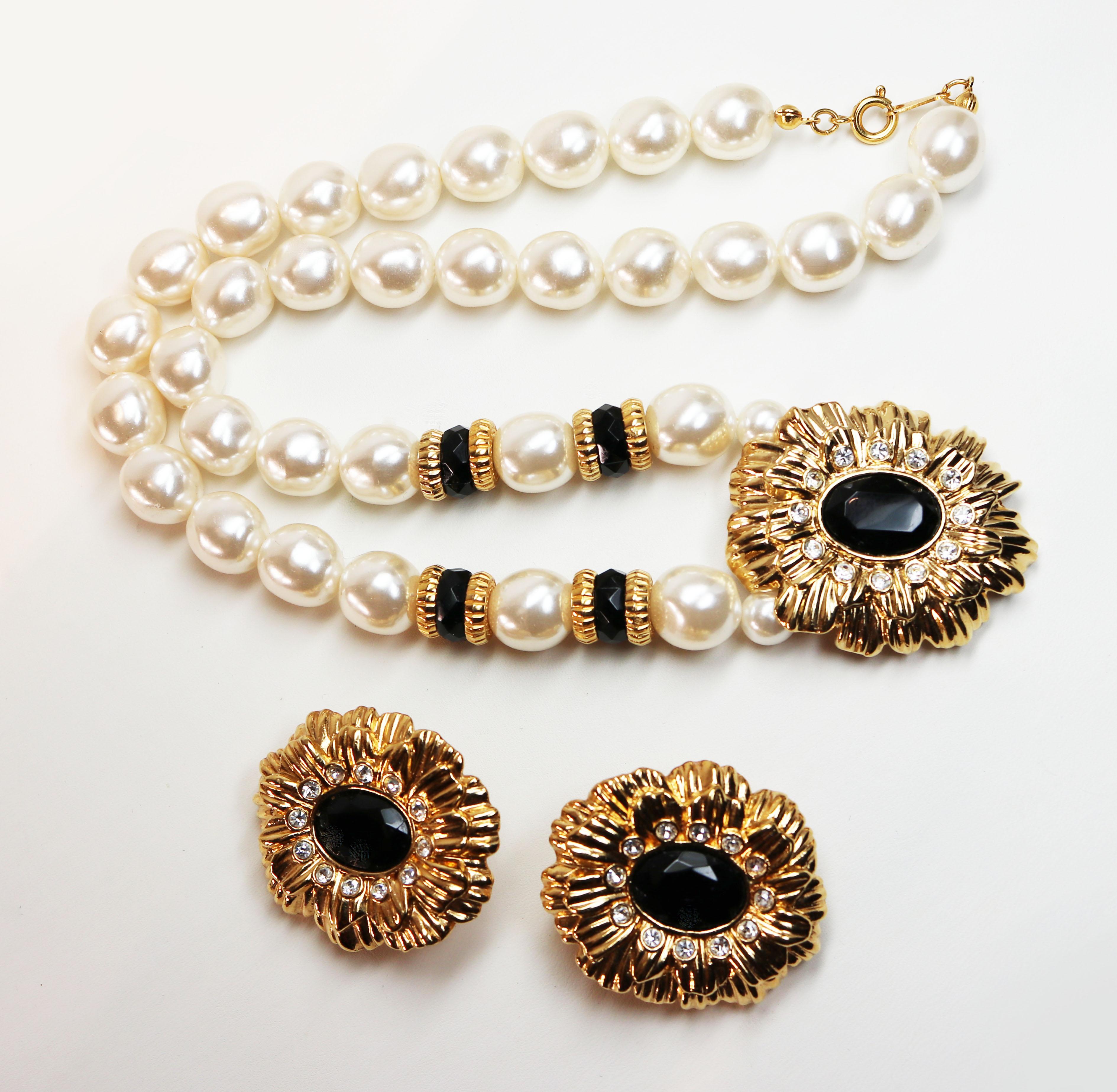 Vintage KENNETH LANE PEARLS *signed* Sunflower Necklace & Clip-on Earrings ~ 22K Gold Plating with Simulated Pearl and Onyx Demi Parure
The necklace and earrings are 22K gold plated and are signed K.J.L. for AVON. The necklace is 21