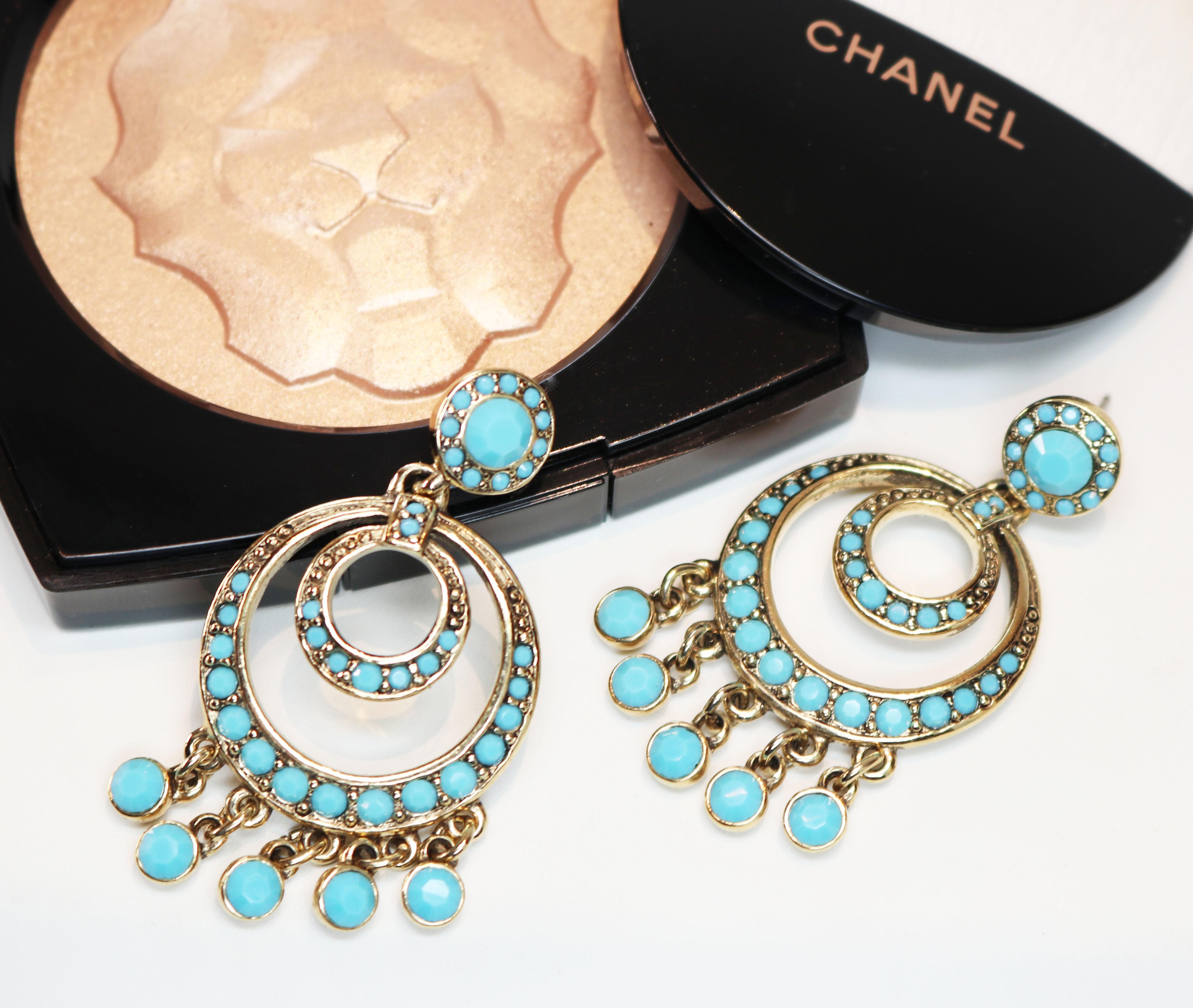 Brand new with original tags Kenneth Jay Lane Simulated Turquoise Encrusted Gold Pierced Earrings - KJL earrings are more popular than ever and these collectible pieces will be instant heirlooms! They are a unique and breathtaking design with five,
