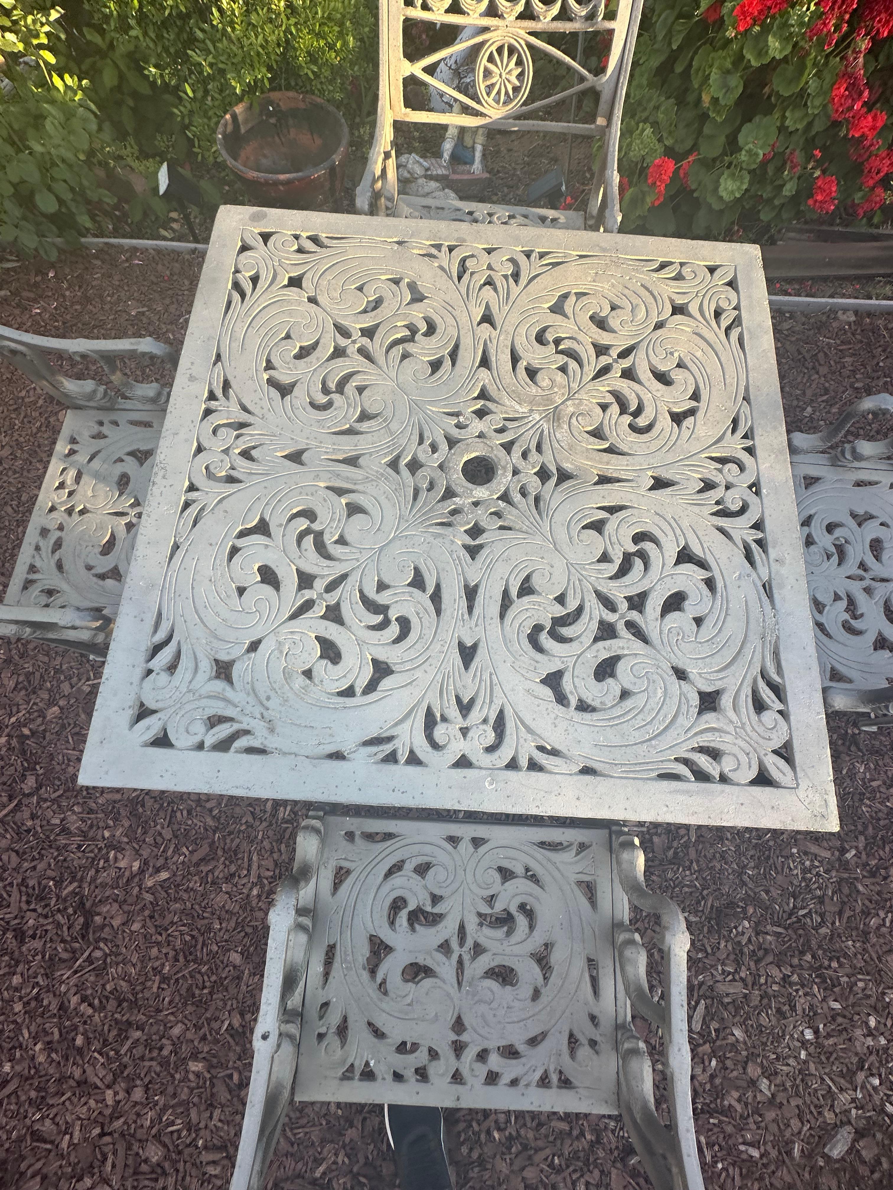 American Kenneth Lynch and Sons Filigree Design Star& Dolphin patio set, Rare, circa 1950 For Sale