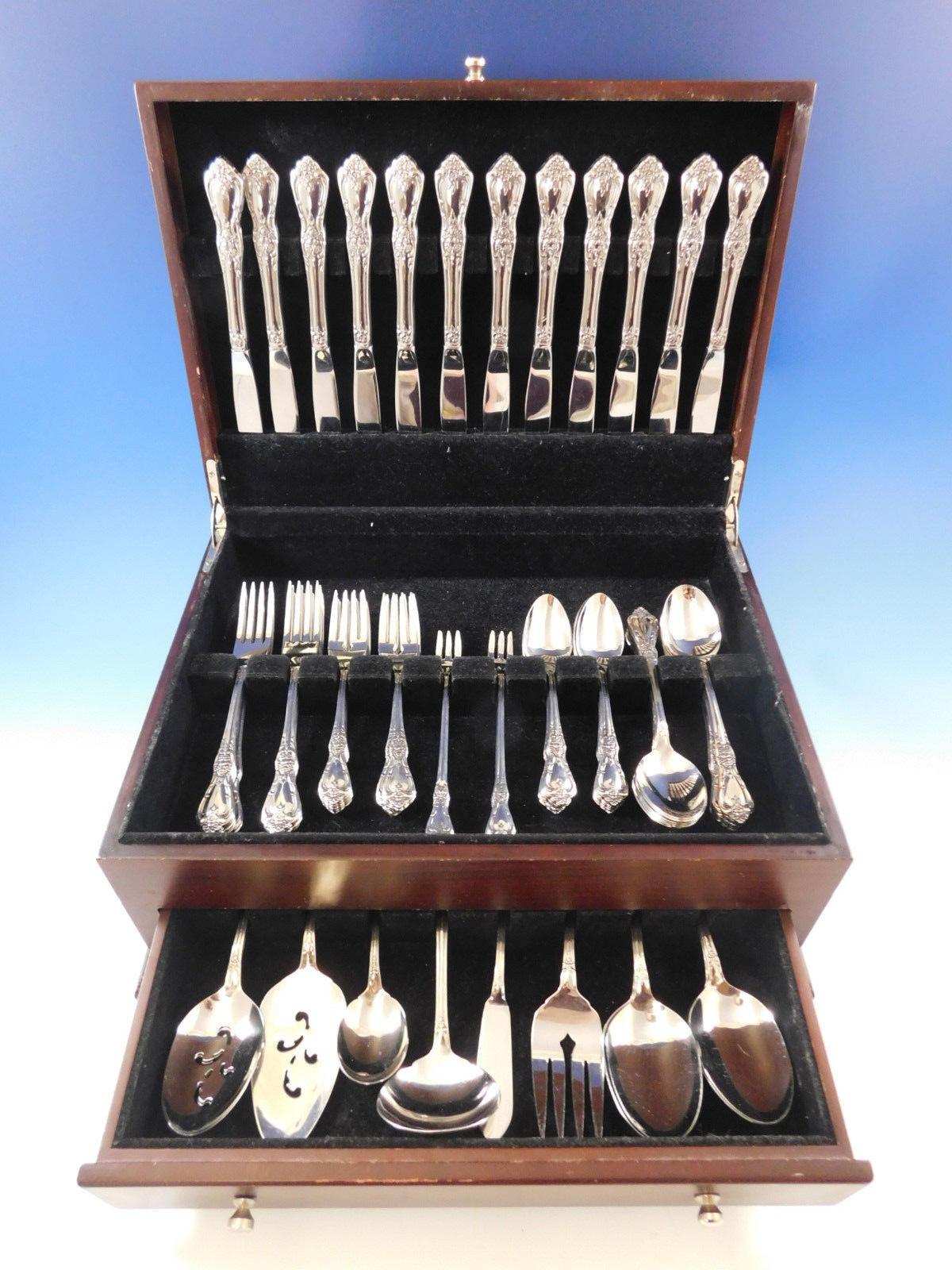 Kennett Square by Oneida stainless steel flatware set of 83 pieces. This scarce set includes:

12 knives, 9