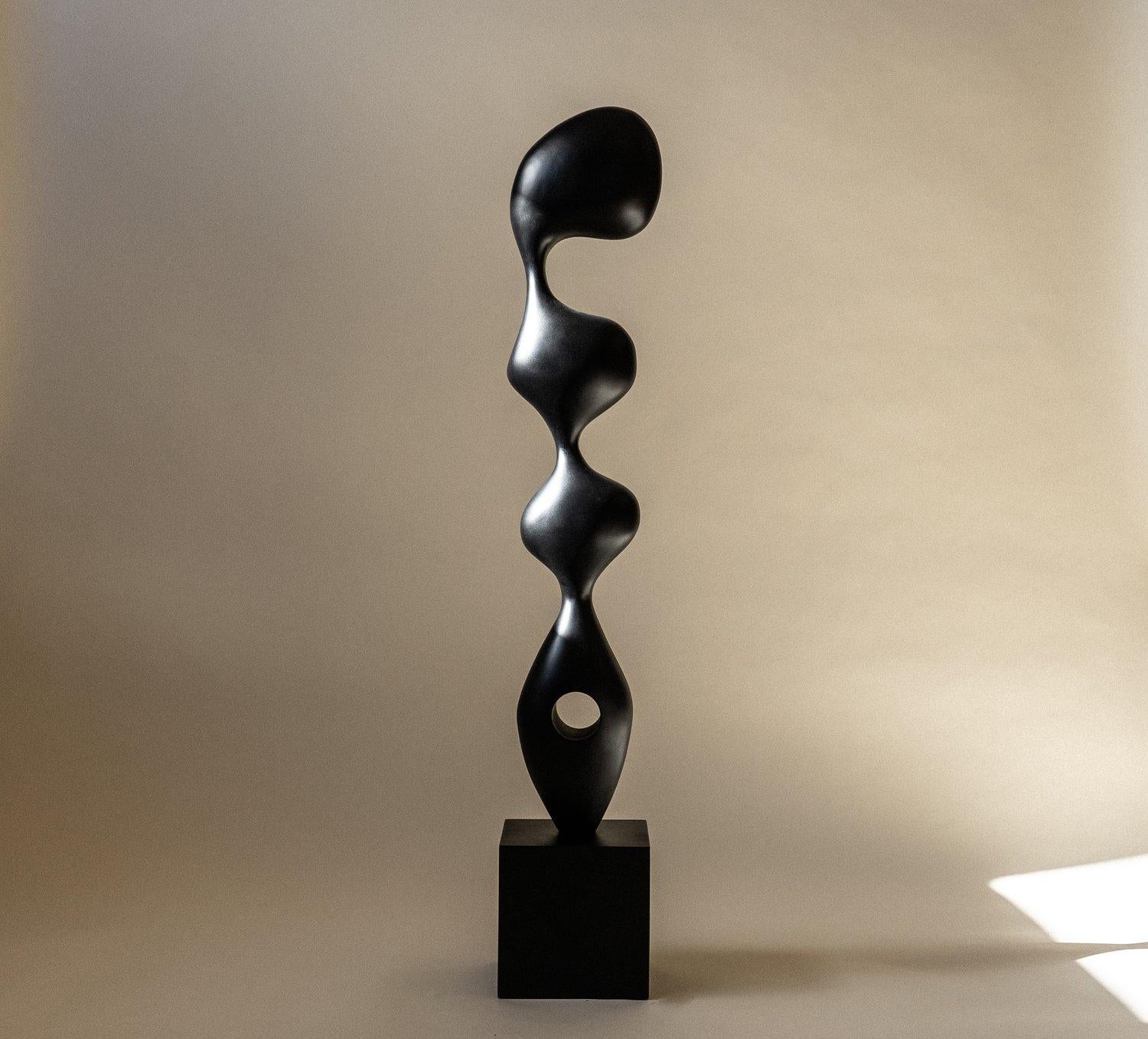 Kensho Sculpture by Chandler McLellan
Limited Edition of 15 Pieces.
Dimensions: D 19.05 x W 22.9 x H 119.4 cm. 
Materials: Painted black hard maple. 

Sculptures will be signed and numbered on the bottom of the base. Wood grain will vary, wood