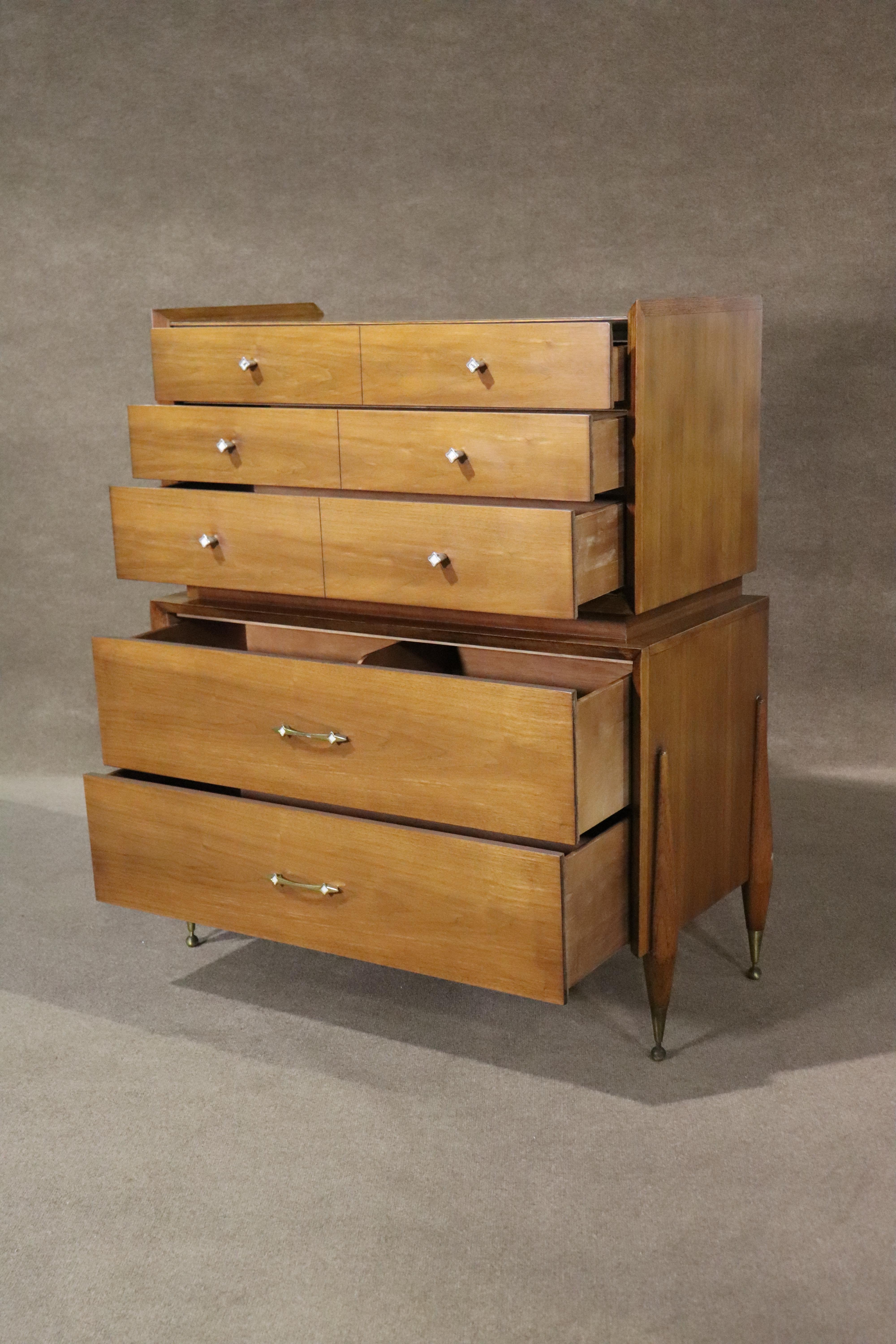 Tall gentleman's chest by Kent Coffey. Five wide drawers, warm walnut wood grain with accenting brass hardware.
Please confirm location NY or NJ
