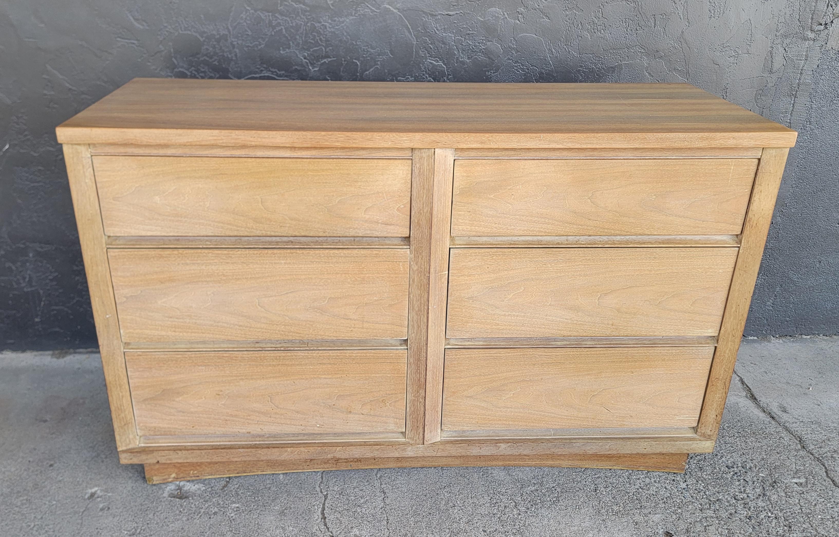 Cerused walnut 6 drawer low dresser by Kent Coffey. Circa. 1950's. Features 6 large drawers. Fine craftsmanship. Solid oak interior woods with dovetail construction. Dust panels and center glides to drawers. Retains its original finish with patina
