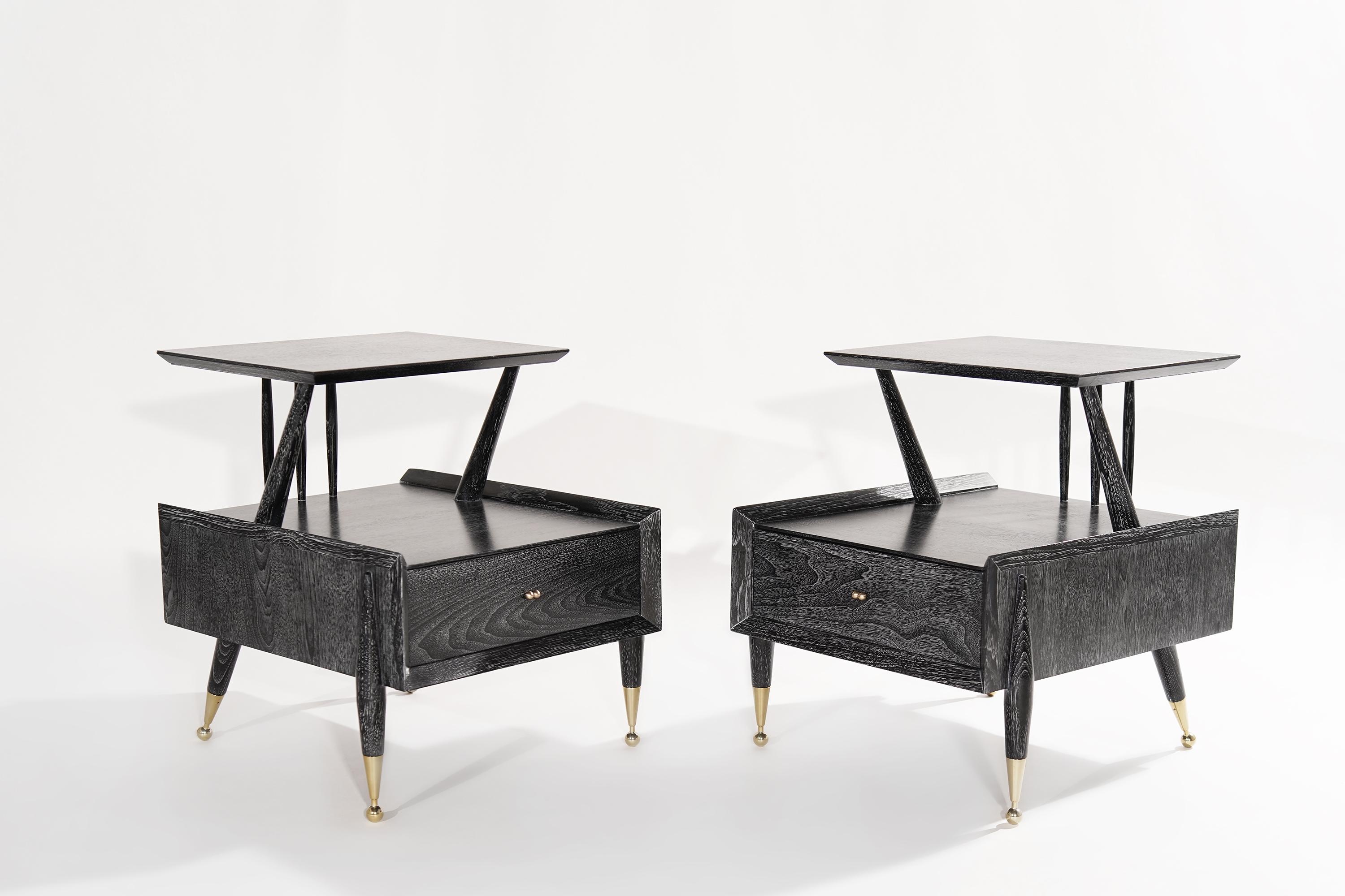 Pair of organic end tables or nightstands designed by Kent Coffey, fully restored and perfectly executed in limed walnut, brass hardware, and sabots have been hand-polished but do retain some patina. 

Other designers working in the organic style