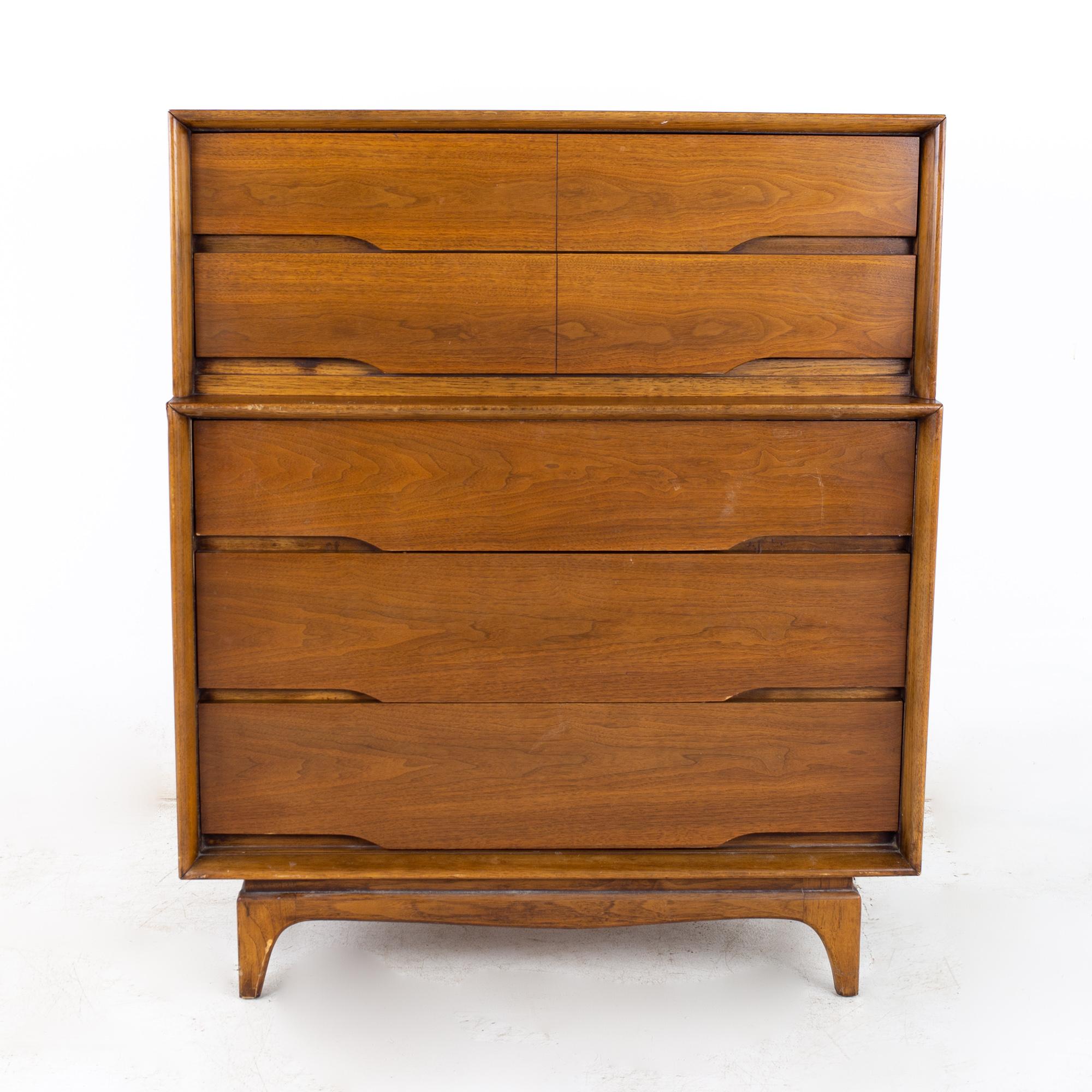 Kent Coffey Forum mid century highboy dresser

Dresser measures: 40 wide x 20.5 deep x 48 inches high

?All pieces of furniture can be had in what we call restored vintage condition. That means the piece is restored upon purchase so it’s free of