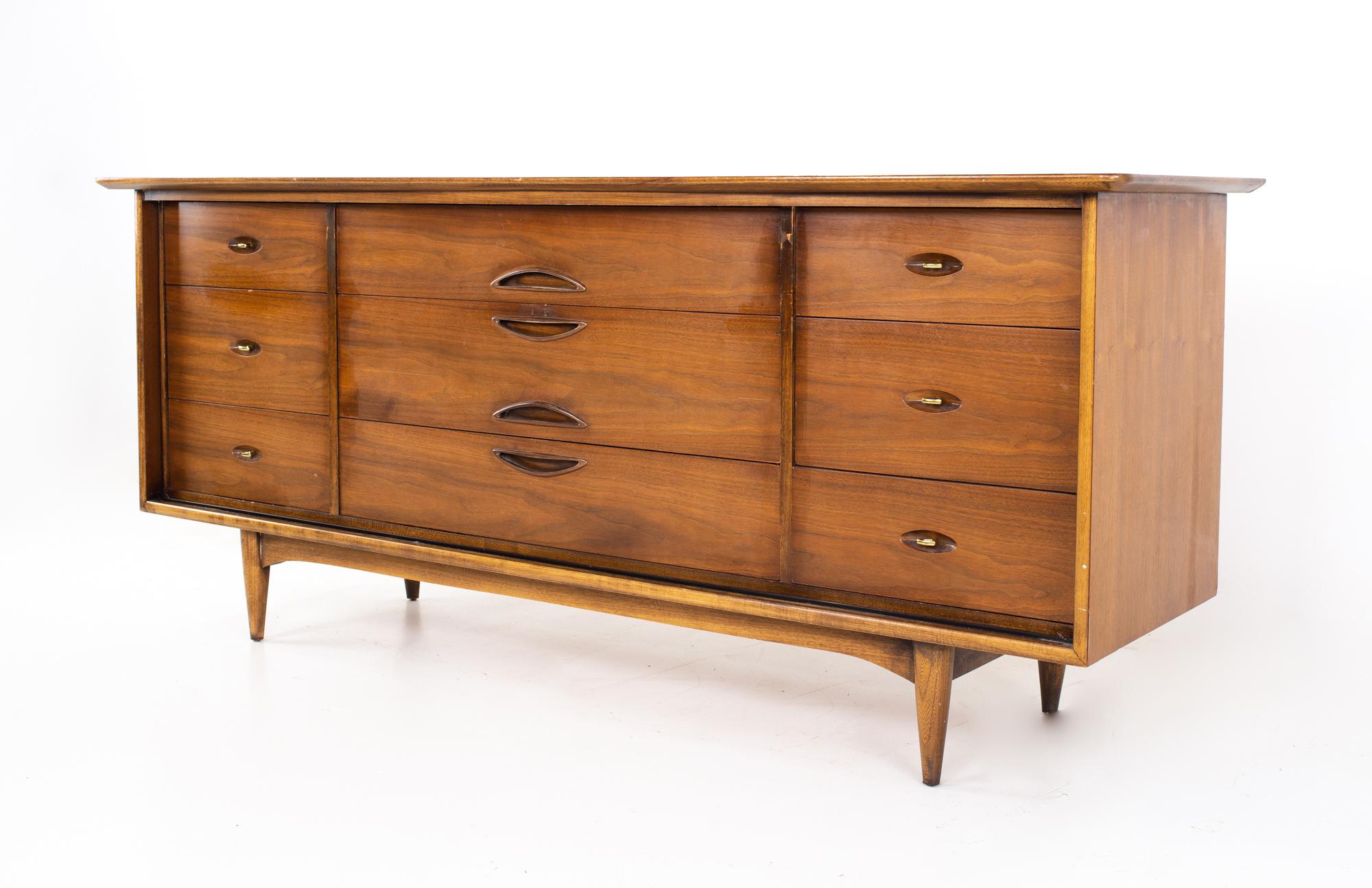 Kent Coffey Greenbrier midcentury walnut 9-drawer lowboy dresser.
Dresser measures: 76 wide x 21.25 deep x 32.5 inches high

All pieces of furniture can be had in what we call restored vintage condition. That means the piece is restored upon