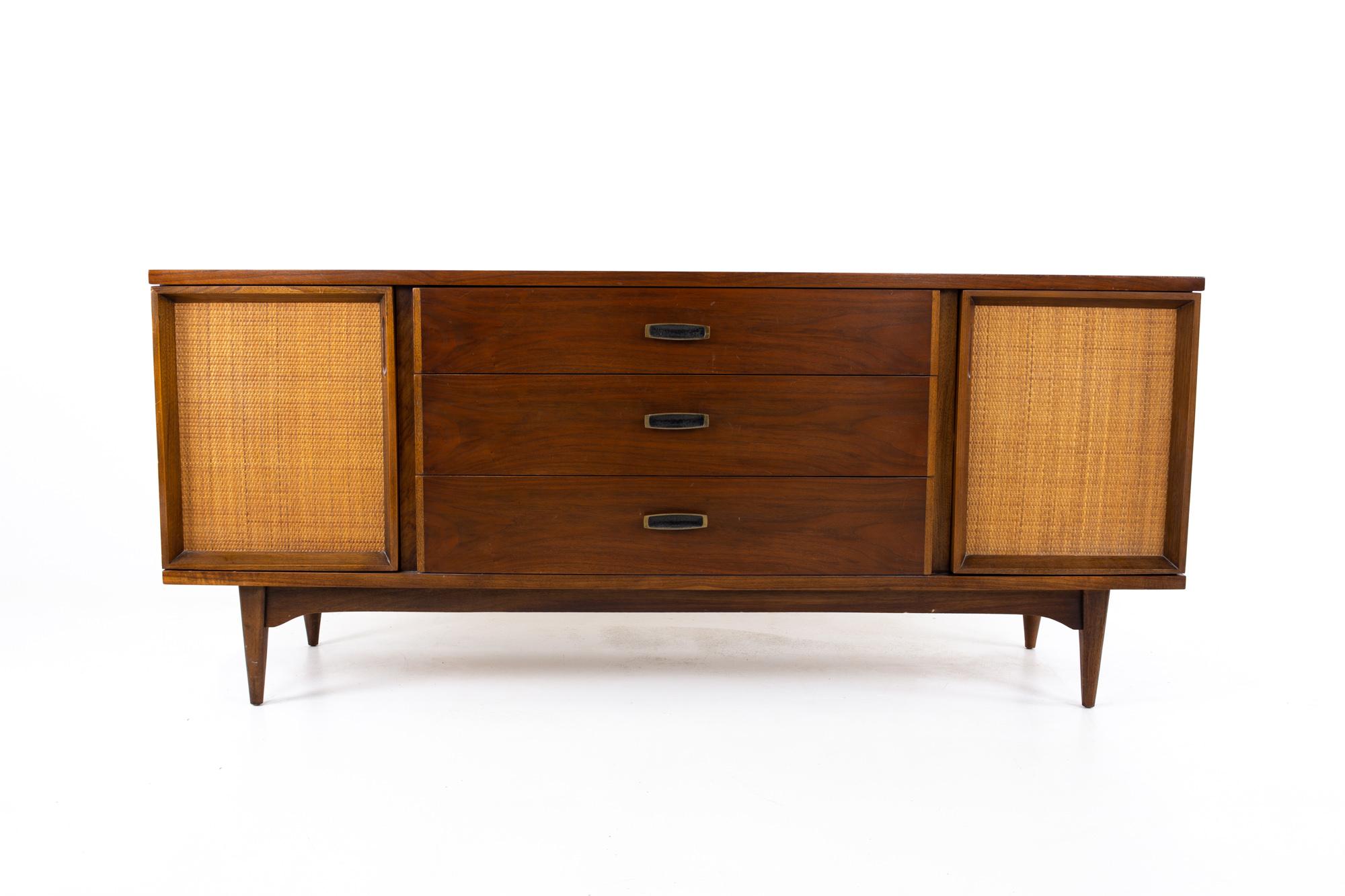 Kent Coffey mid century cane front dresser or credenza
Credenza measures: 72 wide x 18.5 deep x 31 inches high

All pieces of furniture can be had in what we call restored vintage condition. That means the piece is restored upon purchase so it’s