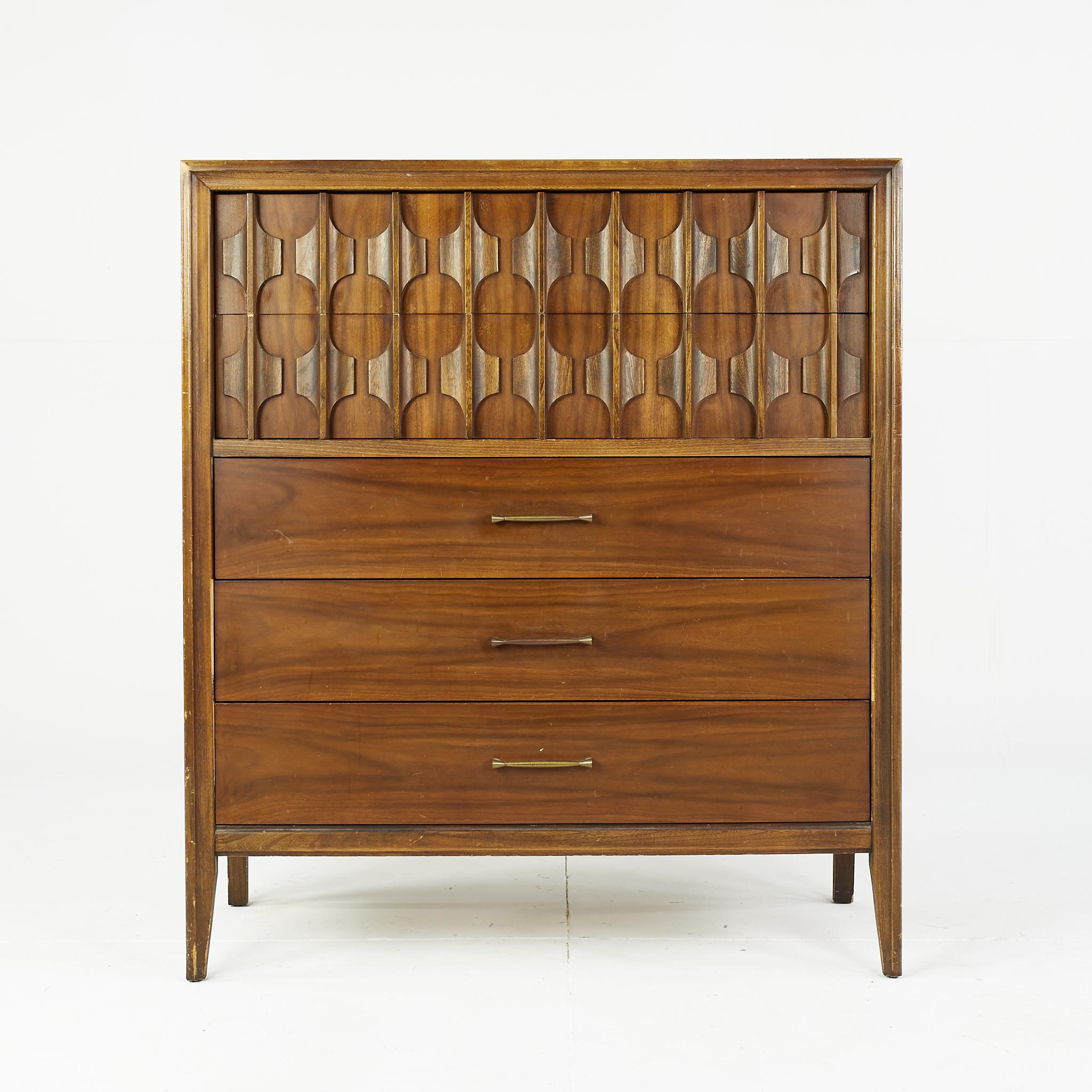 Kent Coffey mid century walnut highboy dresser

This dresser measures: 40 wide x 19 deep x 46 inches high

All pieces of furniture can be had in what we call restored vintage condition. That means the piece is restored upon purchase so it’s free