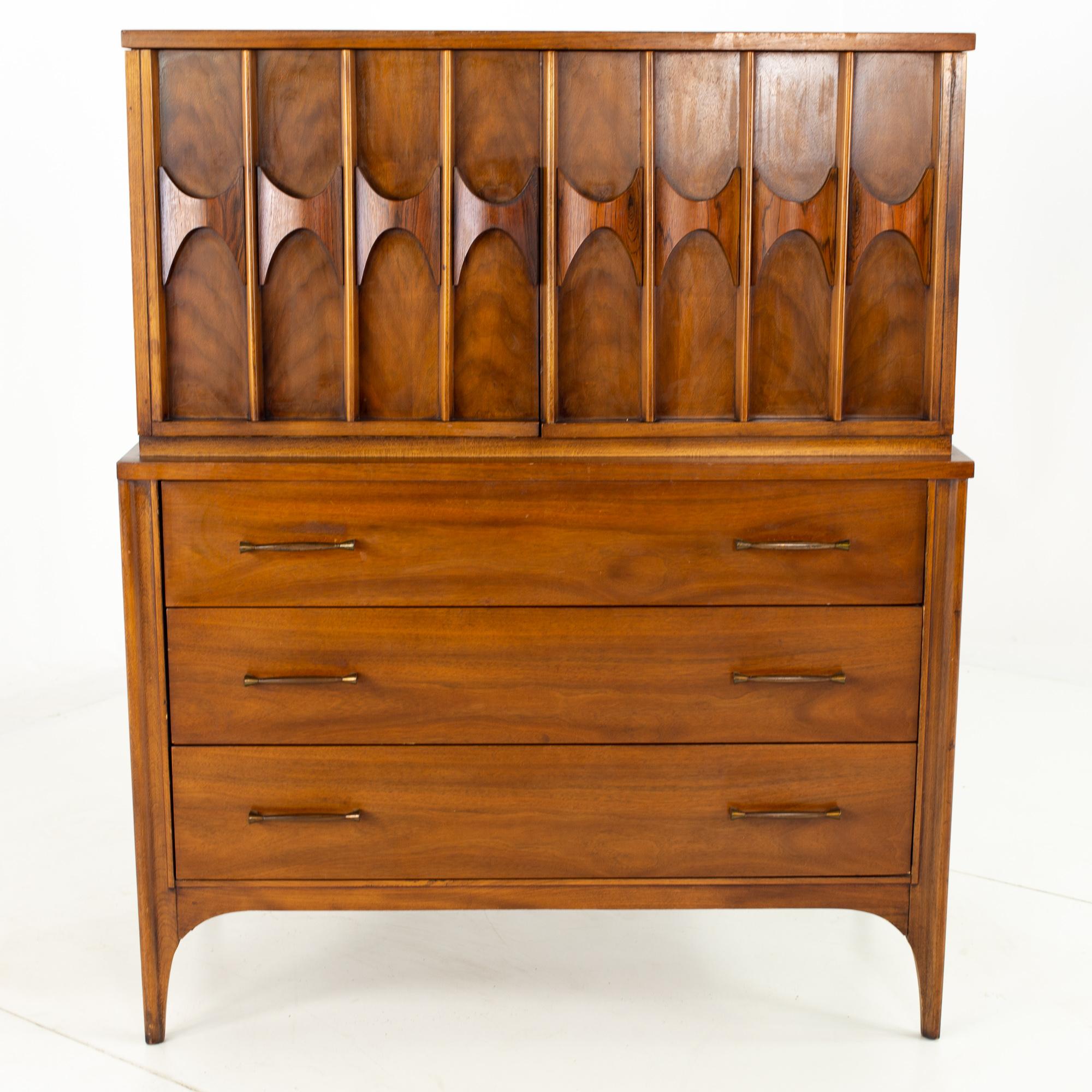 Kent Coffey Perspecta mid-century walnut and rosewood armoire gentlemans chest highboy dresser

Dresser measures: 40.75 wide x 19.25 deep x 51.75 inches high

All pieces of furniture can be had in what we call restored vintage condition. That