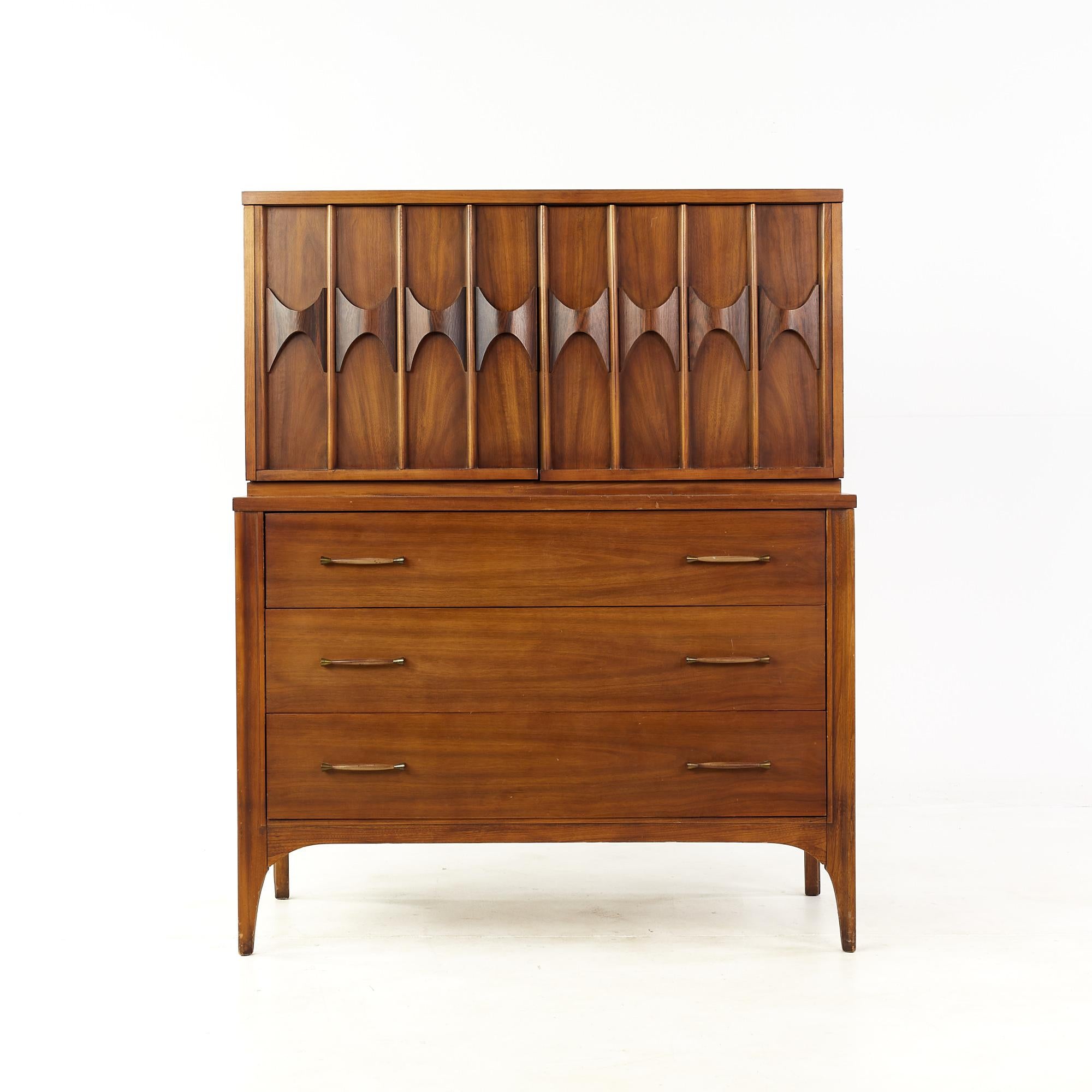 Kent Coffey Perspecta mid century walnut and rosewood Armoire Gentlemans chest highboy dresser

This armoire measures: 42 wide x 20 deep x 52 inches high

All pieces of furniture can be had in what we call restored vintage condition. That means
