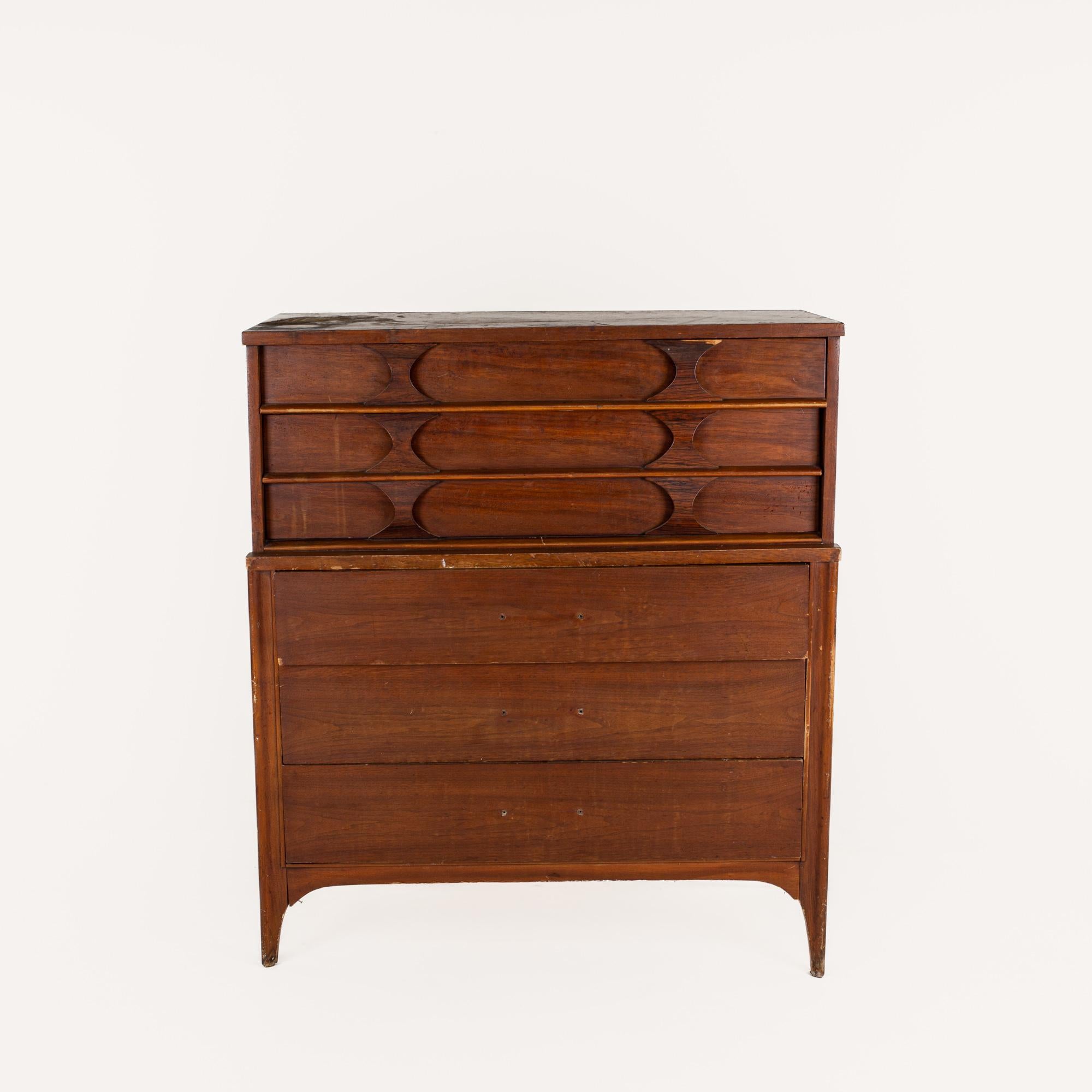 Kent Coffey Perspecta Mid Century Walnut and Rosewood 5 Drawer Highboy Dresser

The dresser measures: 40.25 wide x 19.25 deep x 46 inches high

All pieces of furniture can be had in what we call restored vintage condition. That means the piece