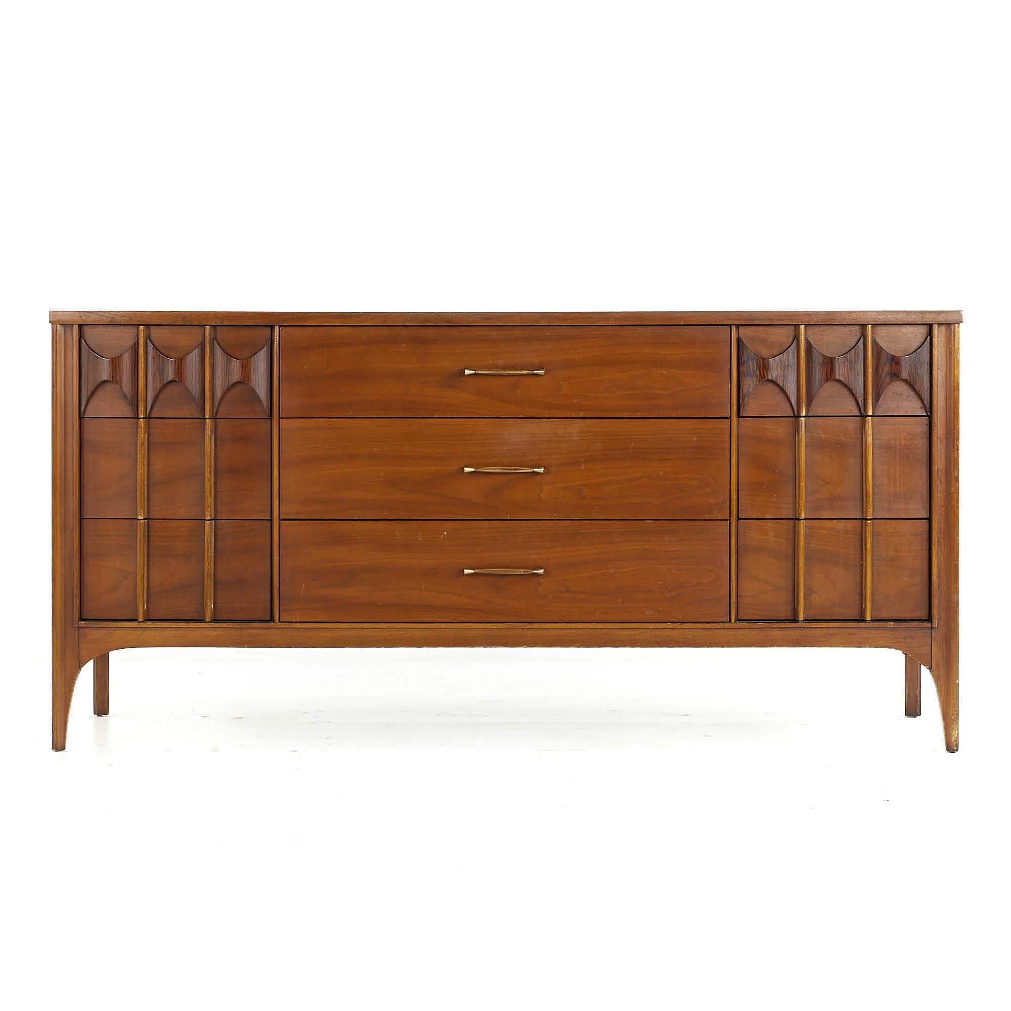 Kent Coffey Perspecta midcentury Walnut and Rosewood 9 Drawer Lowboy Dresser.

This lowboy measures: 64 wide x 19 deep x 31 inches high.

All pieces of furniture can be had in what we call restored vintage condition. That means the piece is