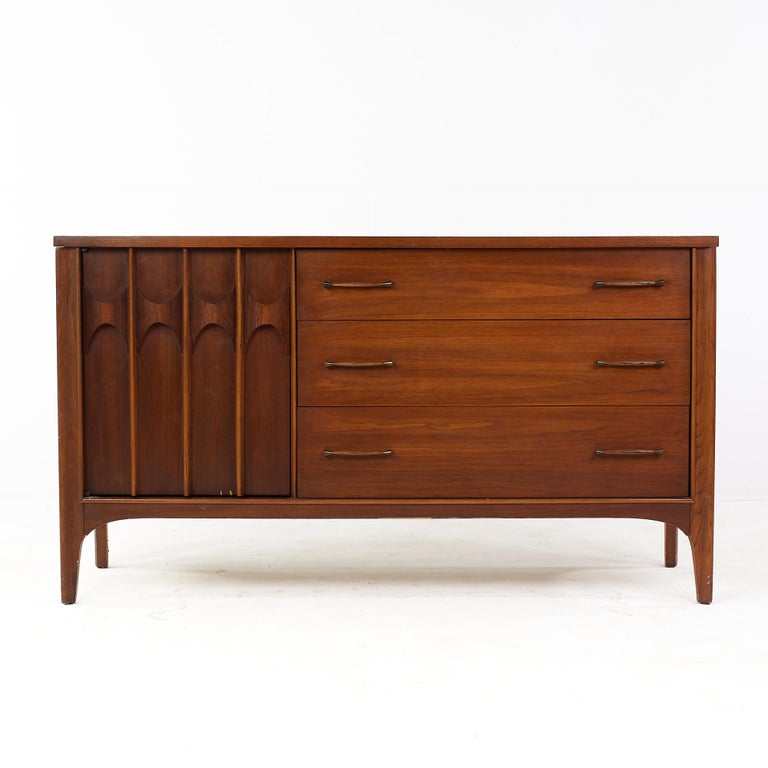 Kent Coffey Perspecta mid-century walnut and rosewood credenza.

This credenza measures: 55.5 wide x 18.5 deep x 31.25 inches high.

All pieces of furniture can be had in what we call restored vintage condition. That means the piece is restored
