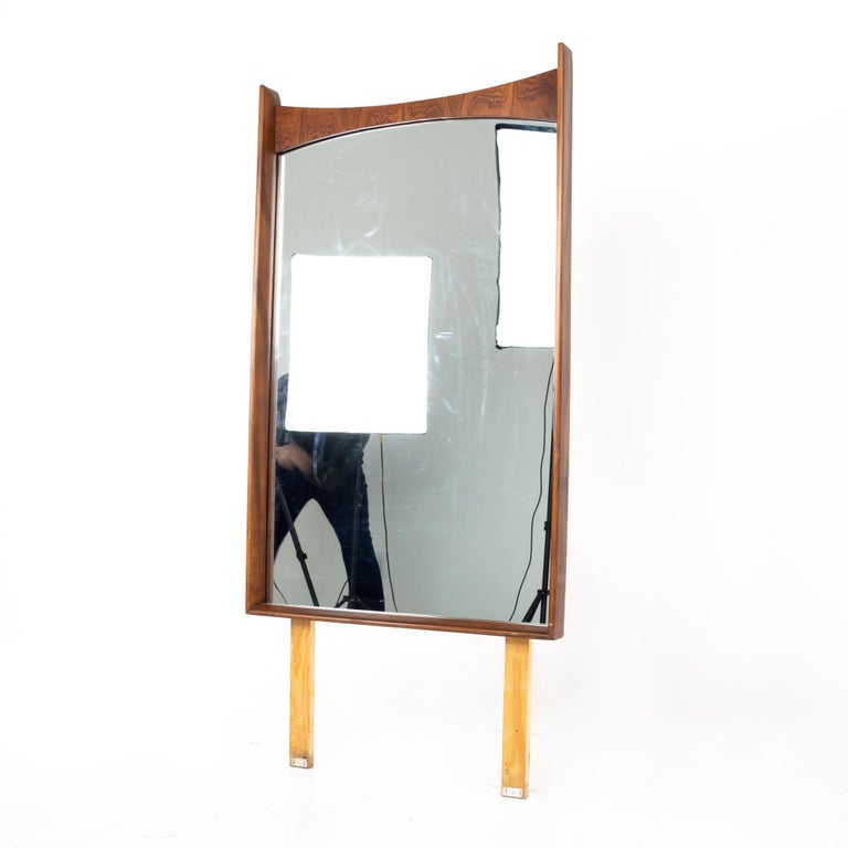 Kent Coffey Perspecta mid century walnut and rosewood mirror
Mirror measures: 27 wide x 2 deep x 57 inches high

All pieces of furniture can be had in what we call restored vintage condition. That means the piece is restored upon purchase so it’s