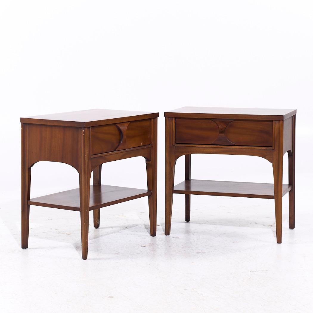 Kent Coffey Perspecta Mid Century Walnut and Rosewood Nightstands - Pair

Each nightstand measures: 23 wide x 15 deep x 24.25 inches high

All pieces of furniture can be had in what we call restored vintage condition. That means the piece is