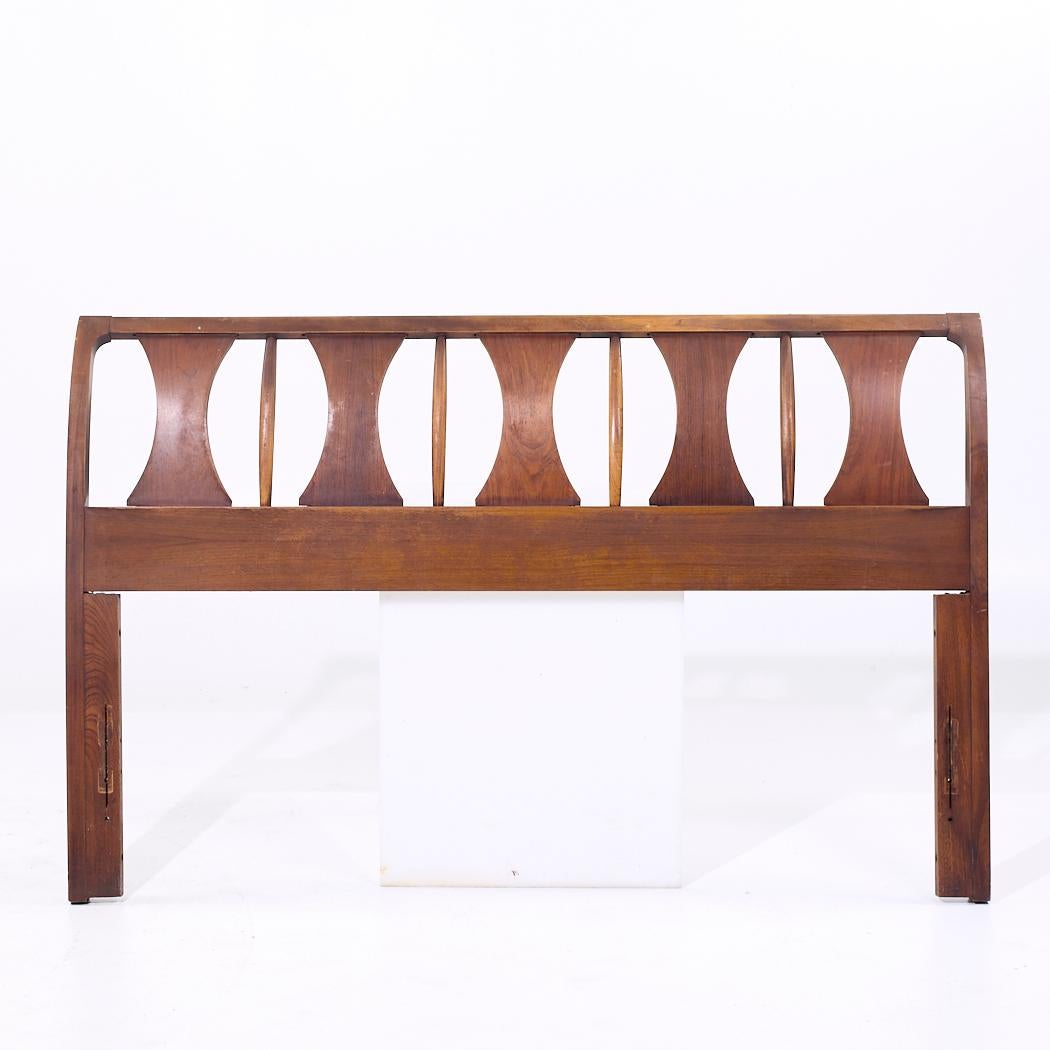 Kent Coffey Perspecta Mid Century Walnut and Rosewood Queen Headboard

This headboard measures: 60 wide x 1.75 deep x 38.5 inches high

We take our photos in a controlled lighting studio to show as much detail as possible. We do not Photoshop out