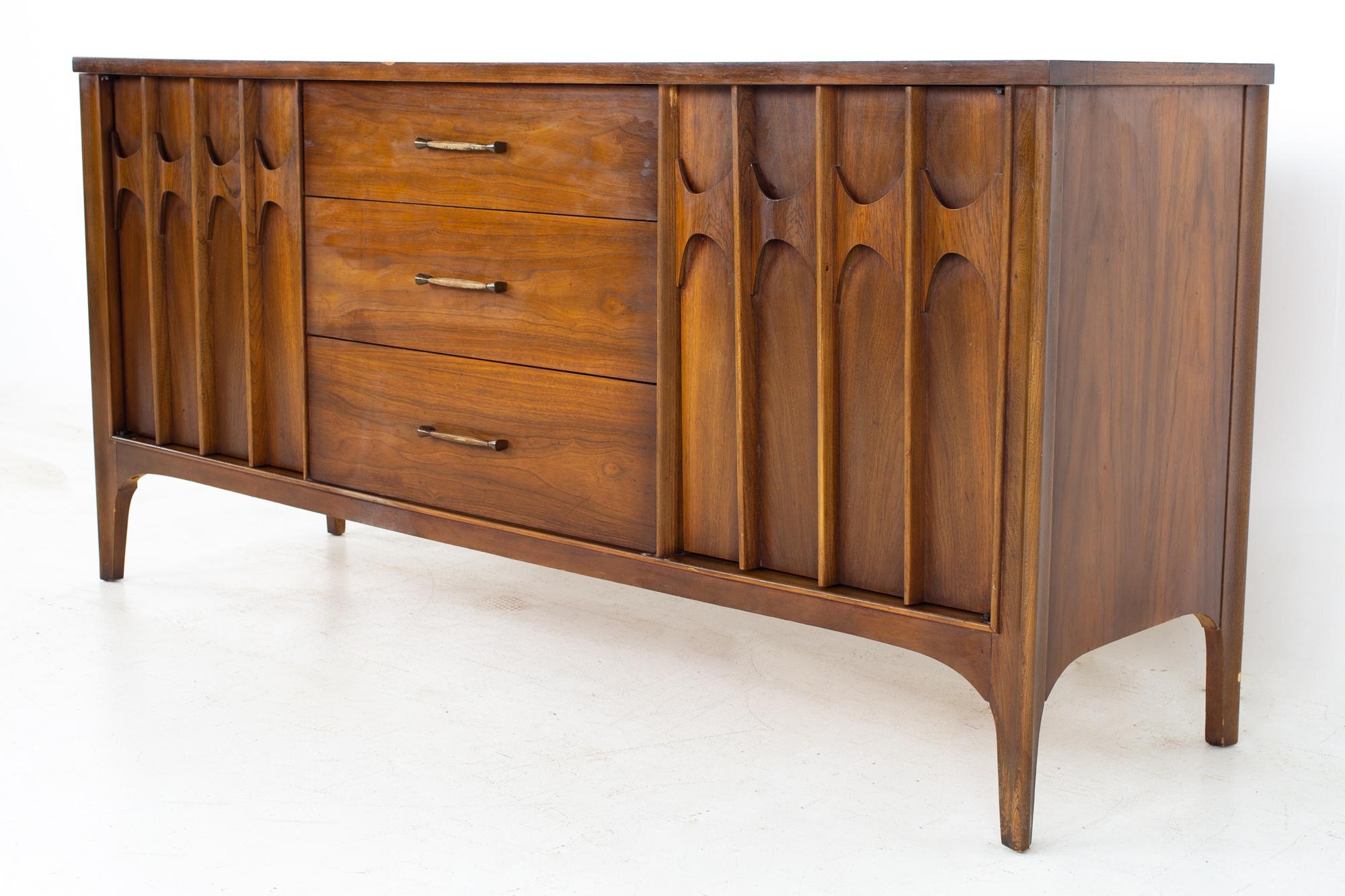 Kent Coffey Perspecta mid century walnut and rosewood sideboard buffet credenza.
Credenza measures: 65.25 wide x 18.5 deep x 31 inches high

All pieces of furniture can be had in what we call restored vintage condition. That means the piece is