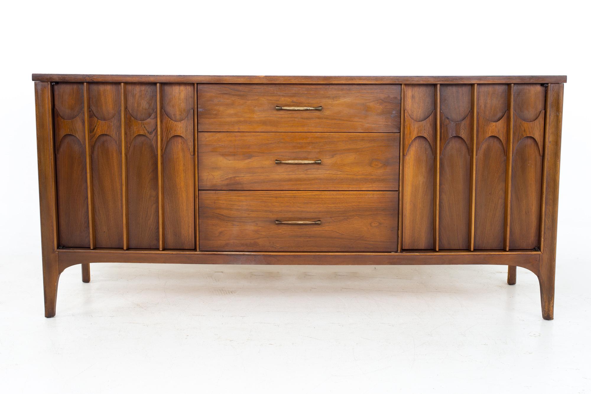 Kent Coffey Perspecta mid century walnut and rosewood sideboard buffet credenza.
Credenza measures: 65.25 wide x 18.5 deep x 31 inches high

All pieces of furniture can be had in what we call restored vintage condition. That means the piece is