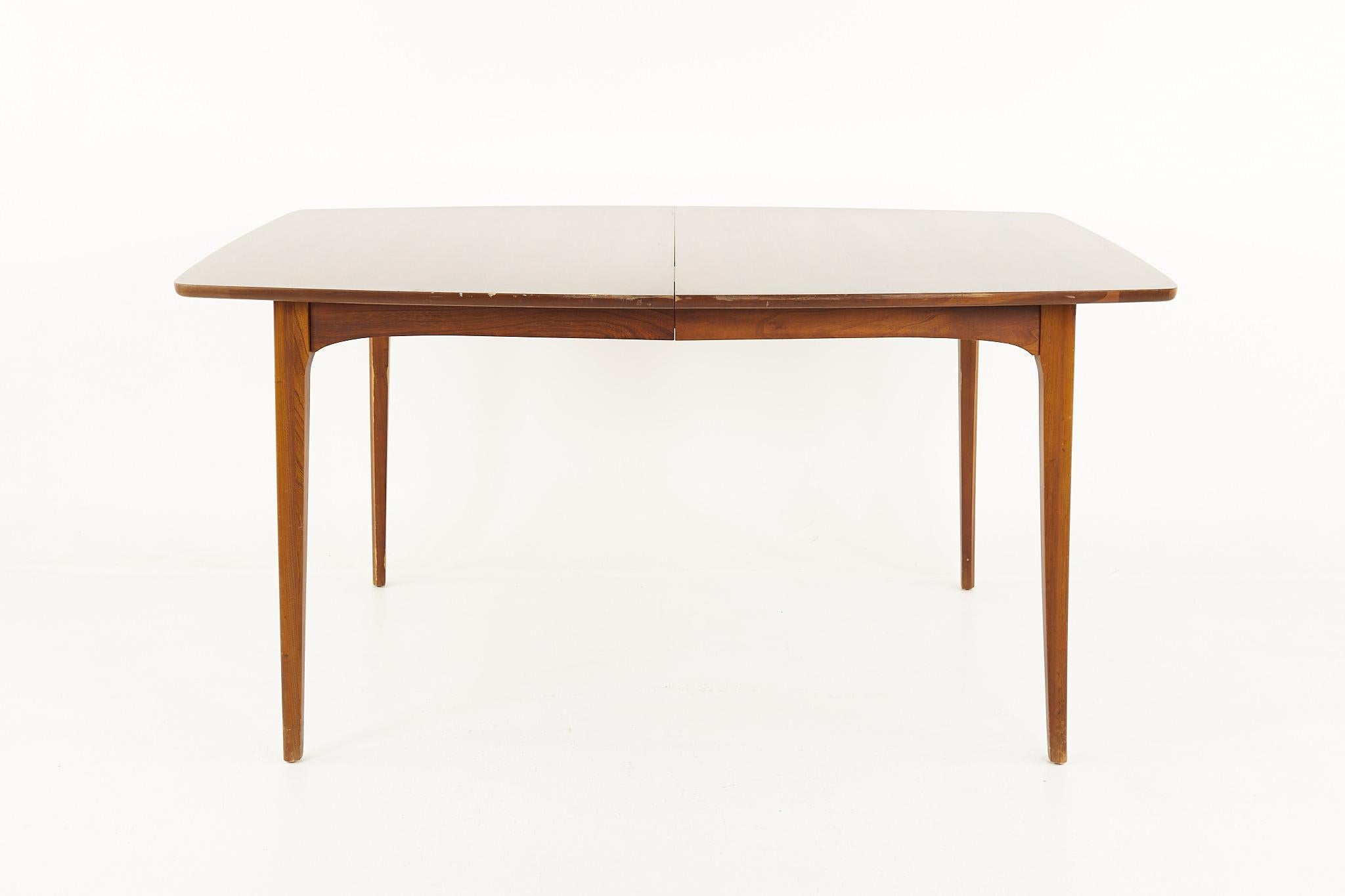 Kent Coffey Perspecta mid century walnut surfboard dining table

This table measures: 60 wide x 42 deep x 29.5 inches high, with a chair clearance of 26.5 inches

All pieces of furniture can be had in what we call restored vintage condition.