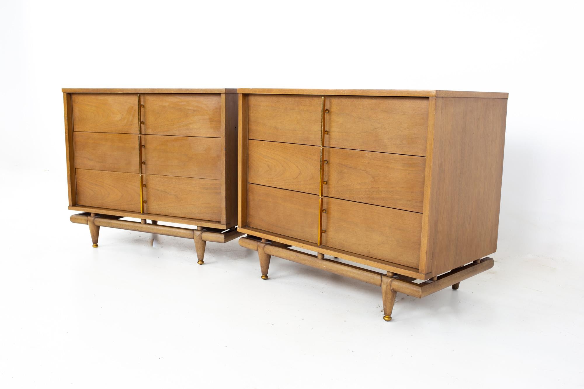 Kent Coffey Sequence mid century walnut and brass 3 drawer chests - A pair
Each chest measures: 36 wide x 20 deep x 30.5 inches high

All pieces of furniture can be had in what we call restored vintage condition. That means the piece is restored