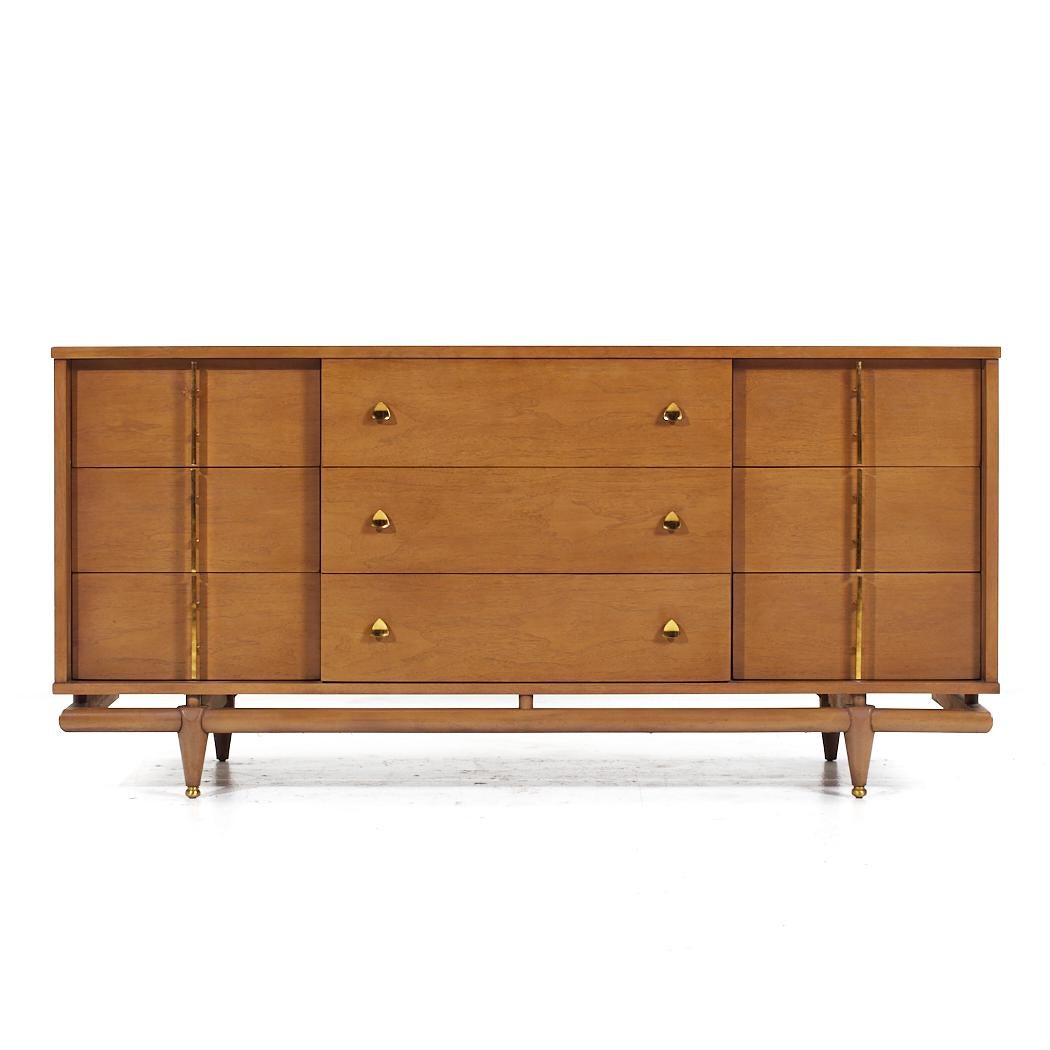 Kent Coffey Sequence Mid Century Walnut and Brass Lowboy Dresser

This lowboy measures: 64 wide x 20 deep x 30.5 inches high

All pieces of furniture can be had in what we call restored vintage condition. That means the piece is restored upon