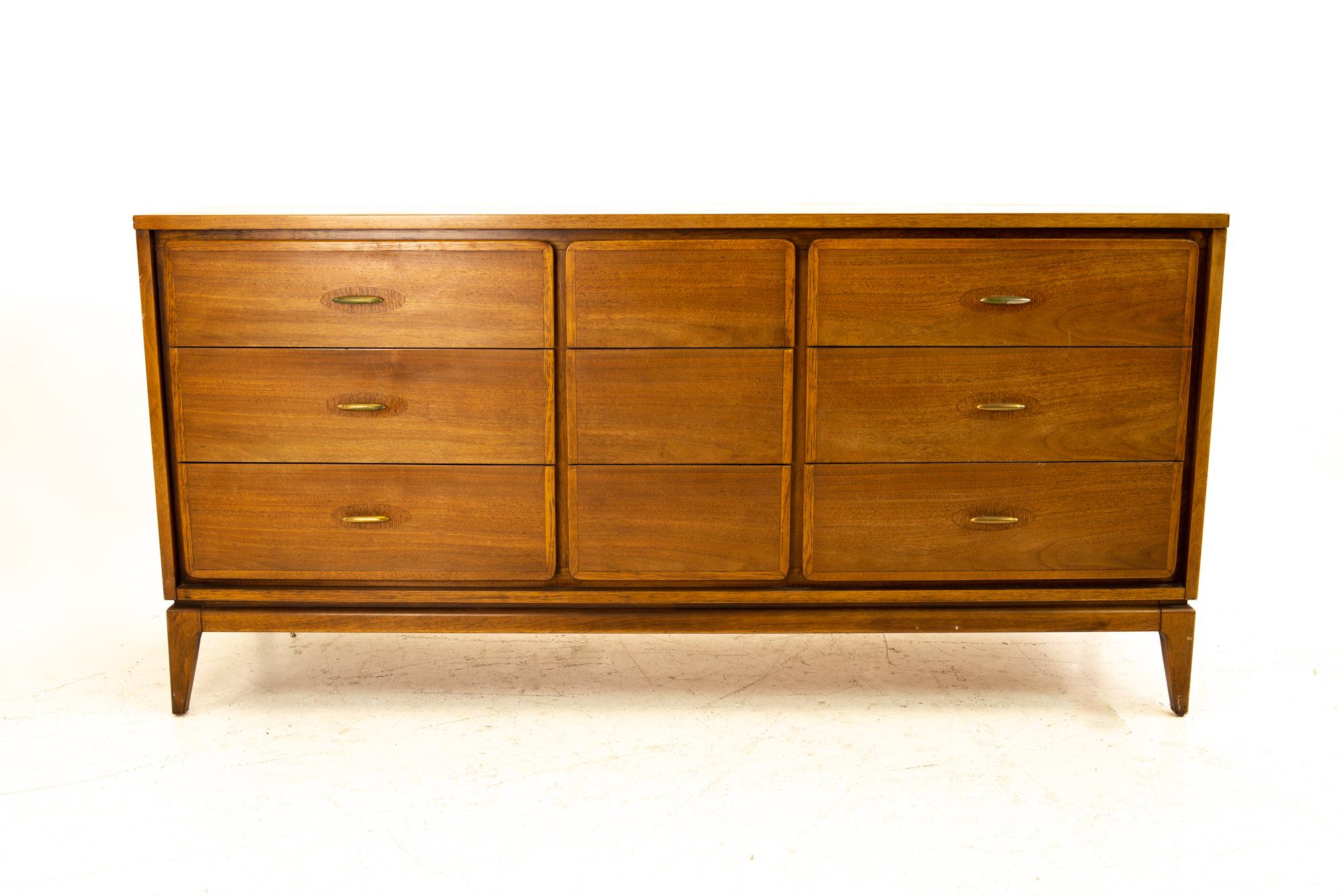 Kent Coffey simplex II midcentury walnut and brass lowboy dresser
Dresser measures: 64 wide x 18.5 deep x 31.25 high

All pieces of furniture can be had in what we call restored vintage condition. That means the piece is restored upon purchase so