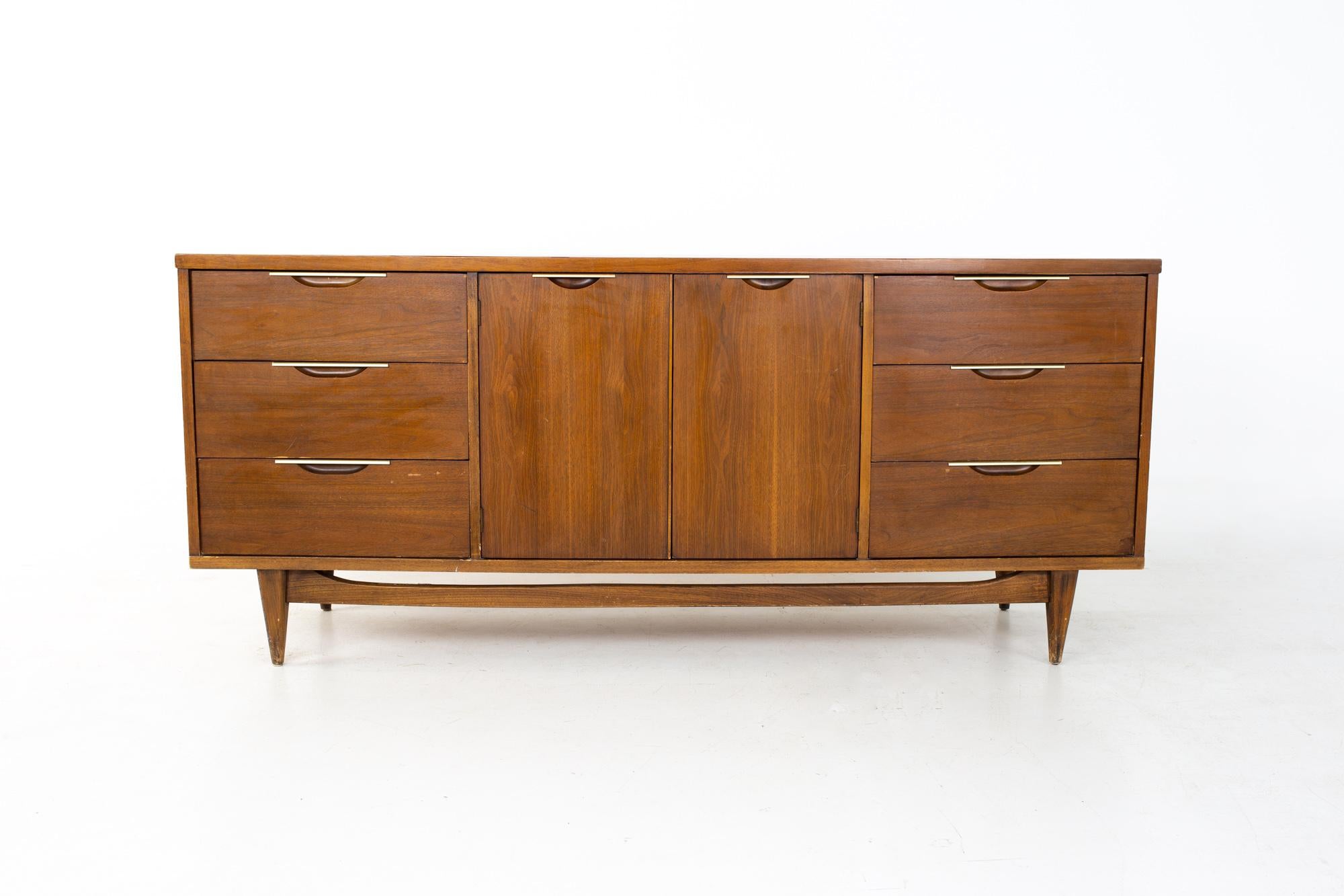 Kent Coffey Tableau mid century walnut and stainless 9 drawer lowboy dresser credenza
Credenza measures: 72 wide x 19 deep x 31.25 inches high

All pieces of furniture can be had in what we call restored vintage condition. That means the piece is
