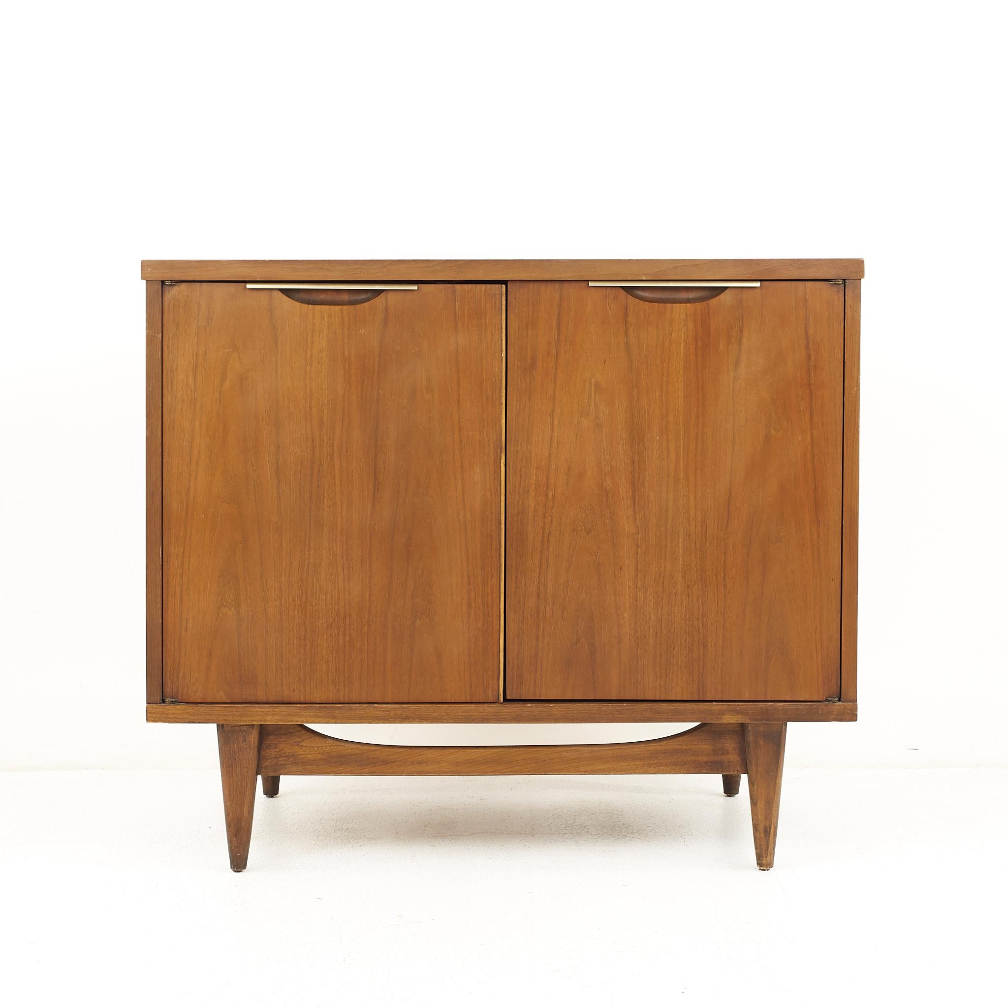Kent Coffey Tableau Mid Century Walnut 2 Door Cabinet

The cabinet measures: 36 wide x 19 deep x 31.25 inches high

All pieces of furniture can be had in what we call restored vintage condition. That means the piece is restored upon purchase so