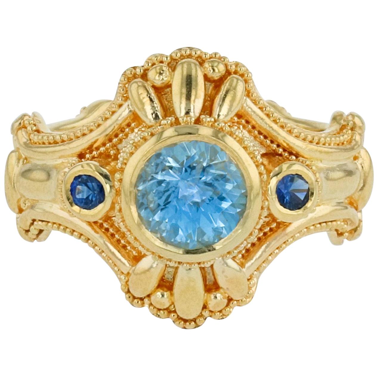 Kent Raible 18 karat Gold Aquamarine Blue Sapphire Three-Stone Ring, Granulation