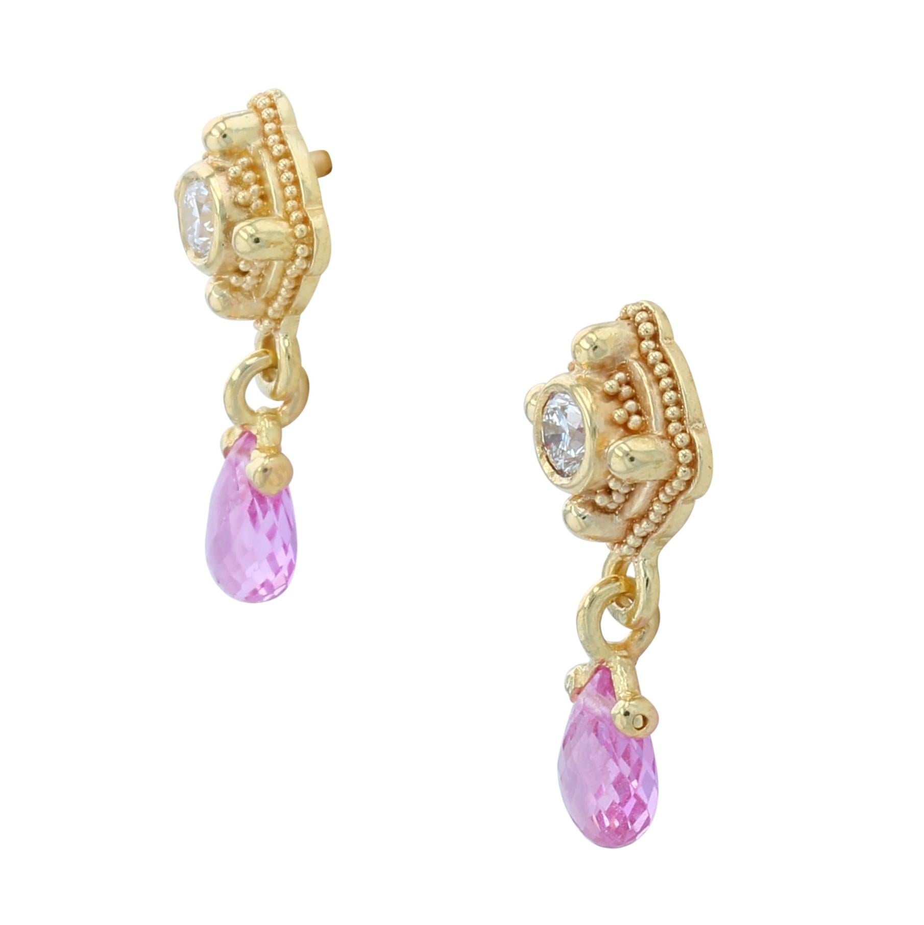 From Kent Raible the limited edition 'Studio Collection' we bring you his intricately detailed Diamond stud earrings with the elegant drop of Pink Sapphire briolets.

Like much of Raible's work these earrings evoke a timeless feeling, sparkling and