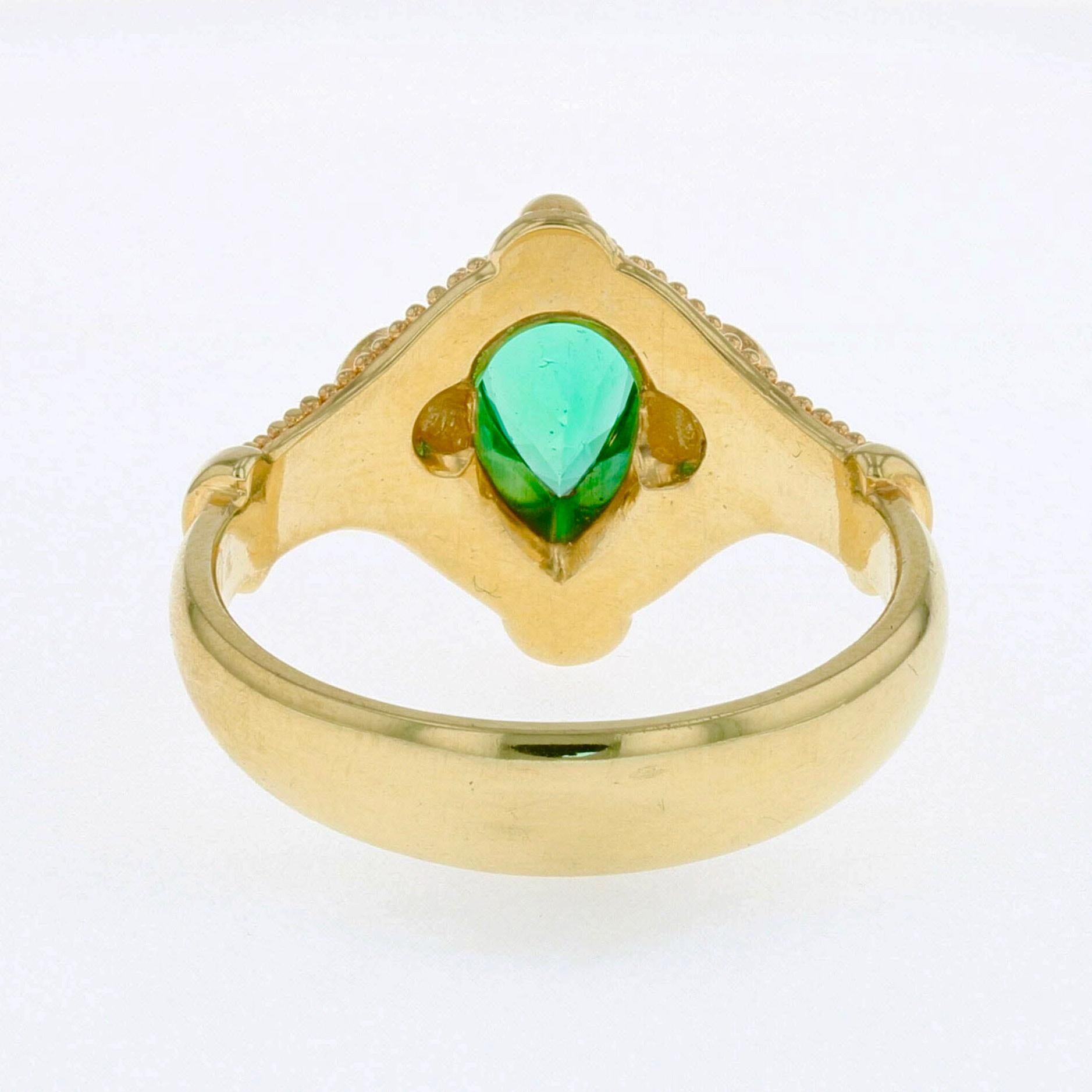 Contemporary Kent Raible 18 Karat Gold Emerald and Diamond Three-Stone Ring with Granulation