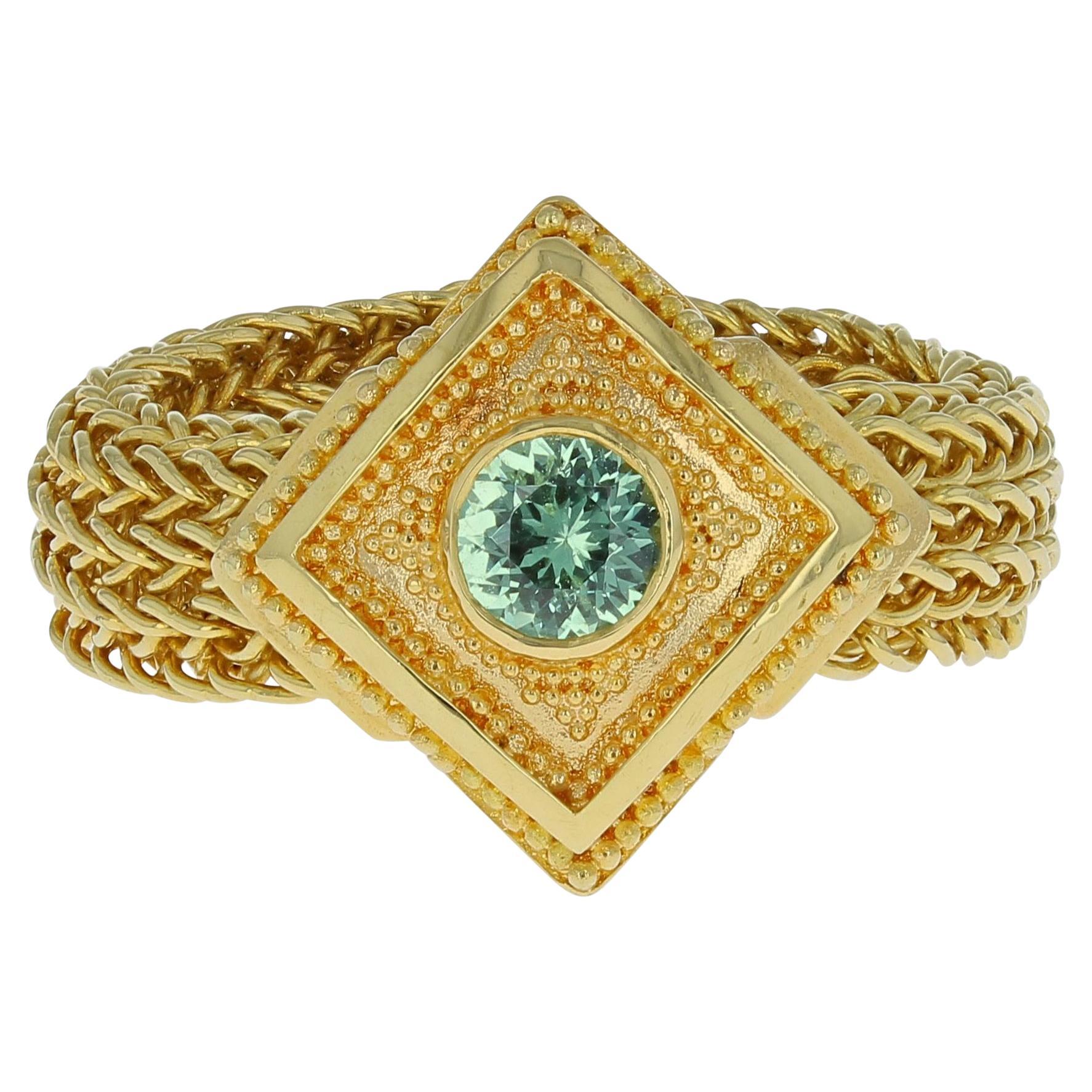 Kent Raible 18 Karat Gold Green Garnet Fashion Ring with Woven Chain