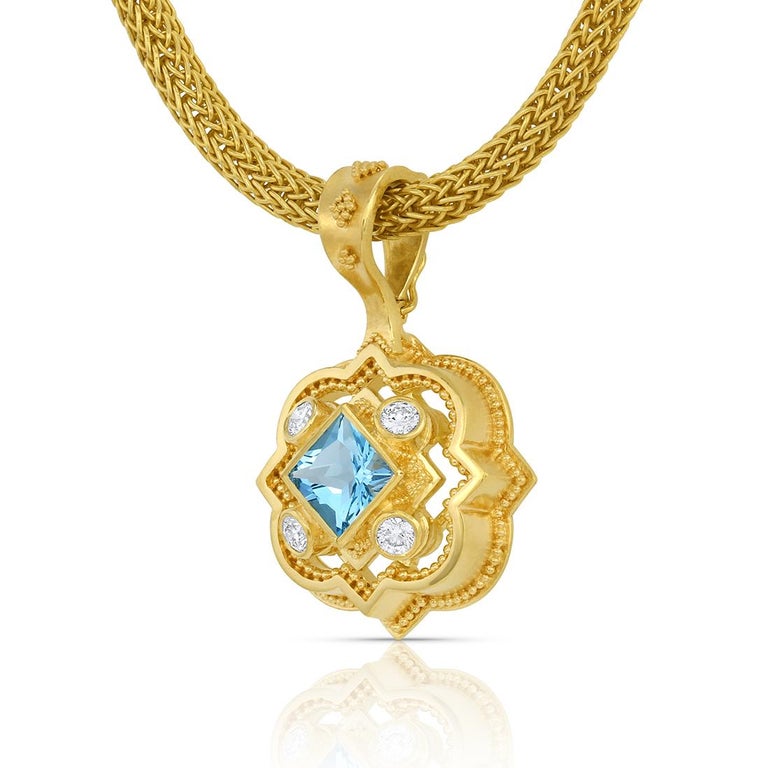 With all the usual attention to detail and craftsmanship we expect from Kent Raible, his Aquamarine and Diamond pendant does not disappoint! This pendant has great depth and dimension while still carrying a feeling of lightness. Raible has achieved