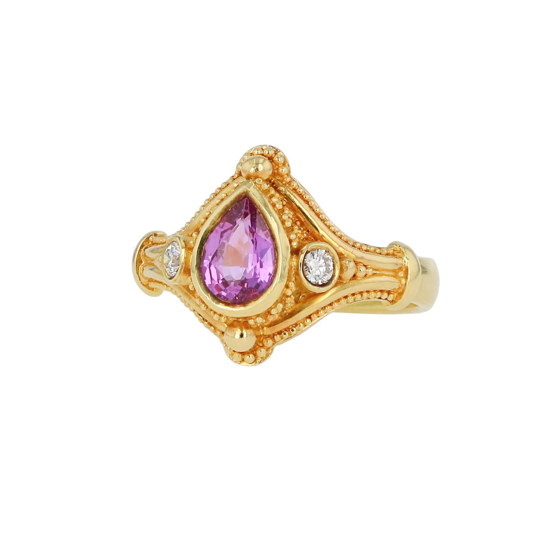 Kent Raible's Pink Sapphire and Diamond three-stone ring features a classic and tailored look with the elegance of fine detailing and Kent Raible's signature 18 karat gold granulation. The sapphire displays a beautiful pink with a hint of lavender