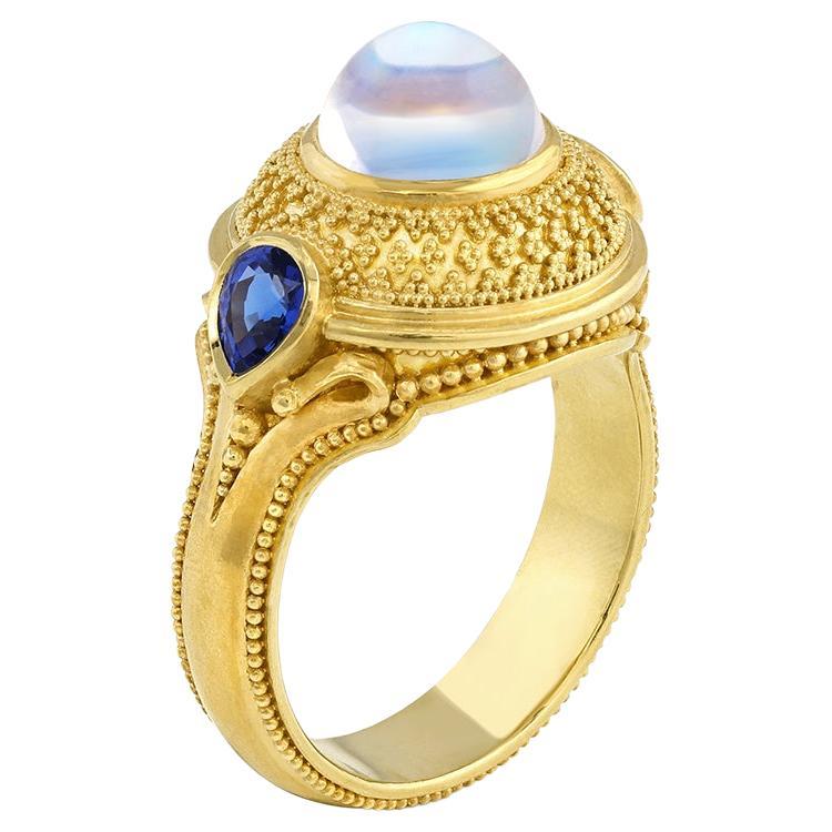 Kent Raible 18 Karat Gold Rainbow Moonstone and Blue Sapphire Dome Ring For Sale